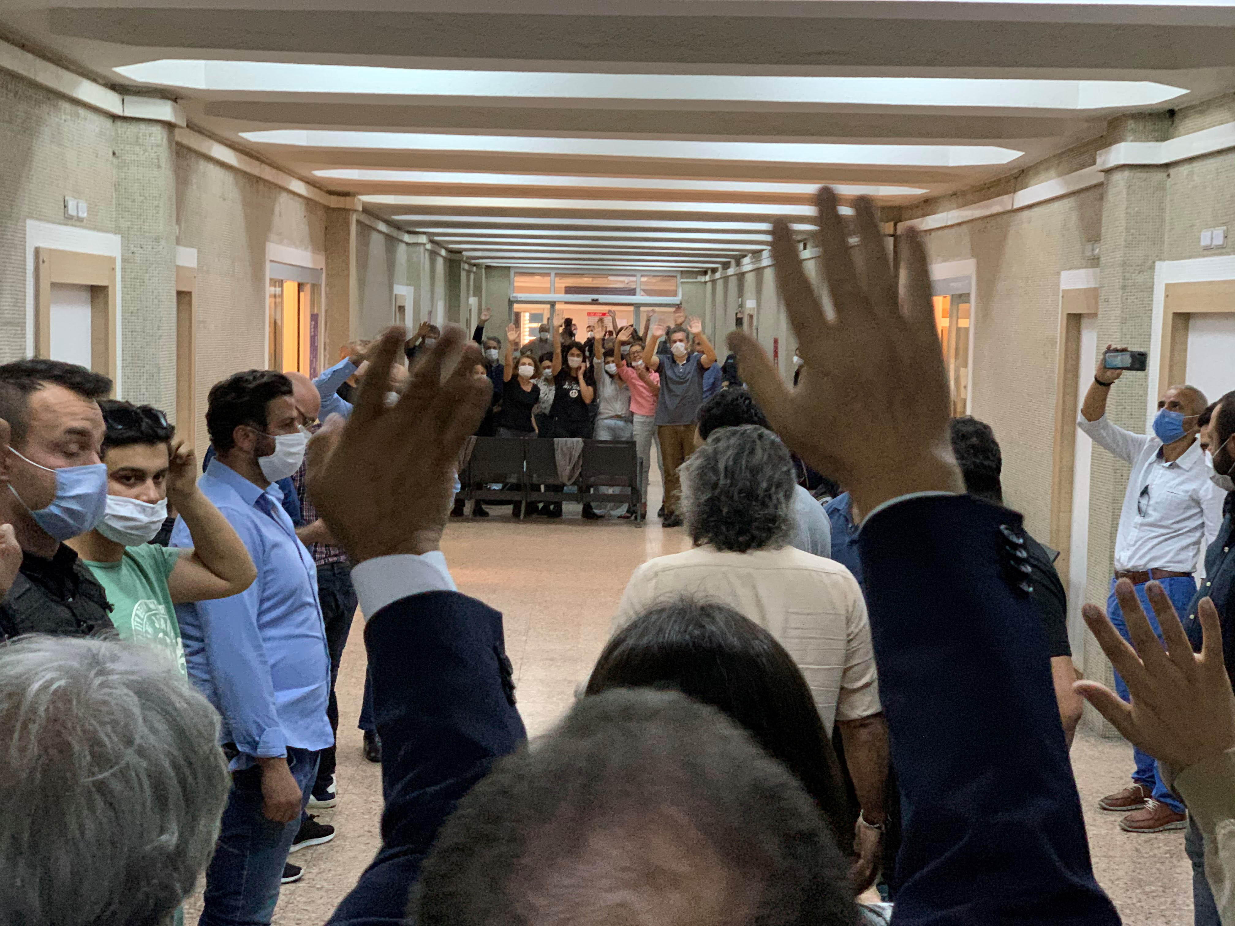 In the corridors of Ankara courthouse, lawyers and MPs wave to Peoples’ Democratic Party politicians and officials waiting to testify before a court. Ankara, October 1, 2020.