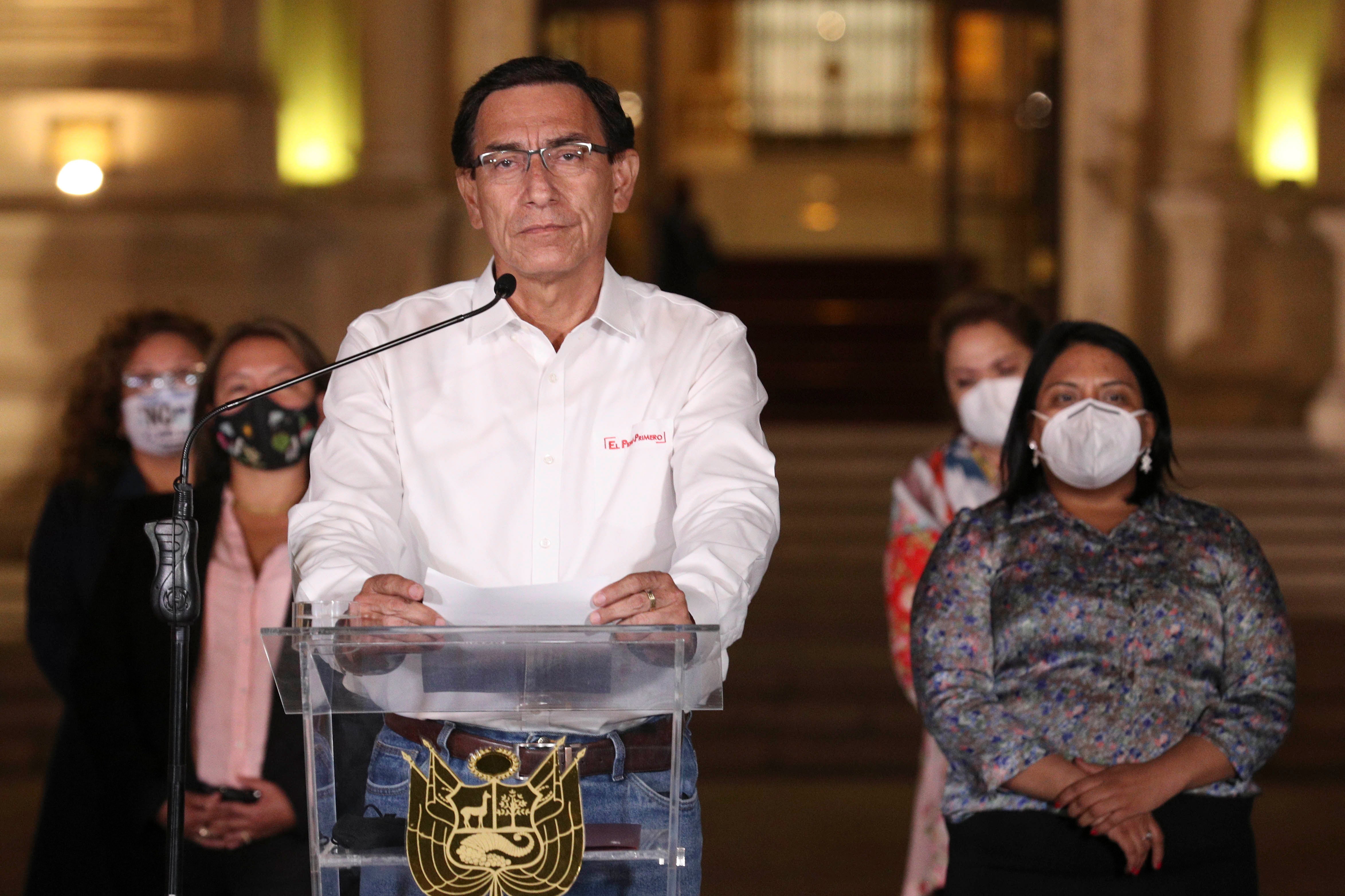 Martín Vizcarra speaks in front of the presidential palace after lawmakers voted to remove him from office in Lima, Peru, Monday, Nov. 9, 2020.