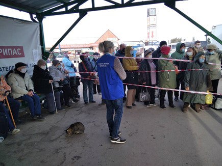 People waiting to cross at the Stanytsia Luhanska checkpoint on the government-controlled side, October 23, 2020.