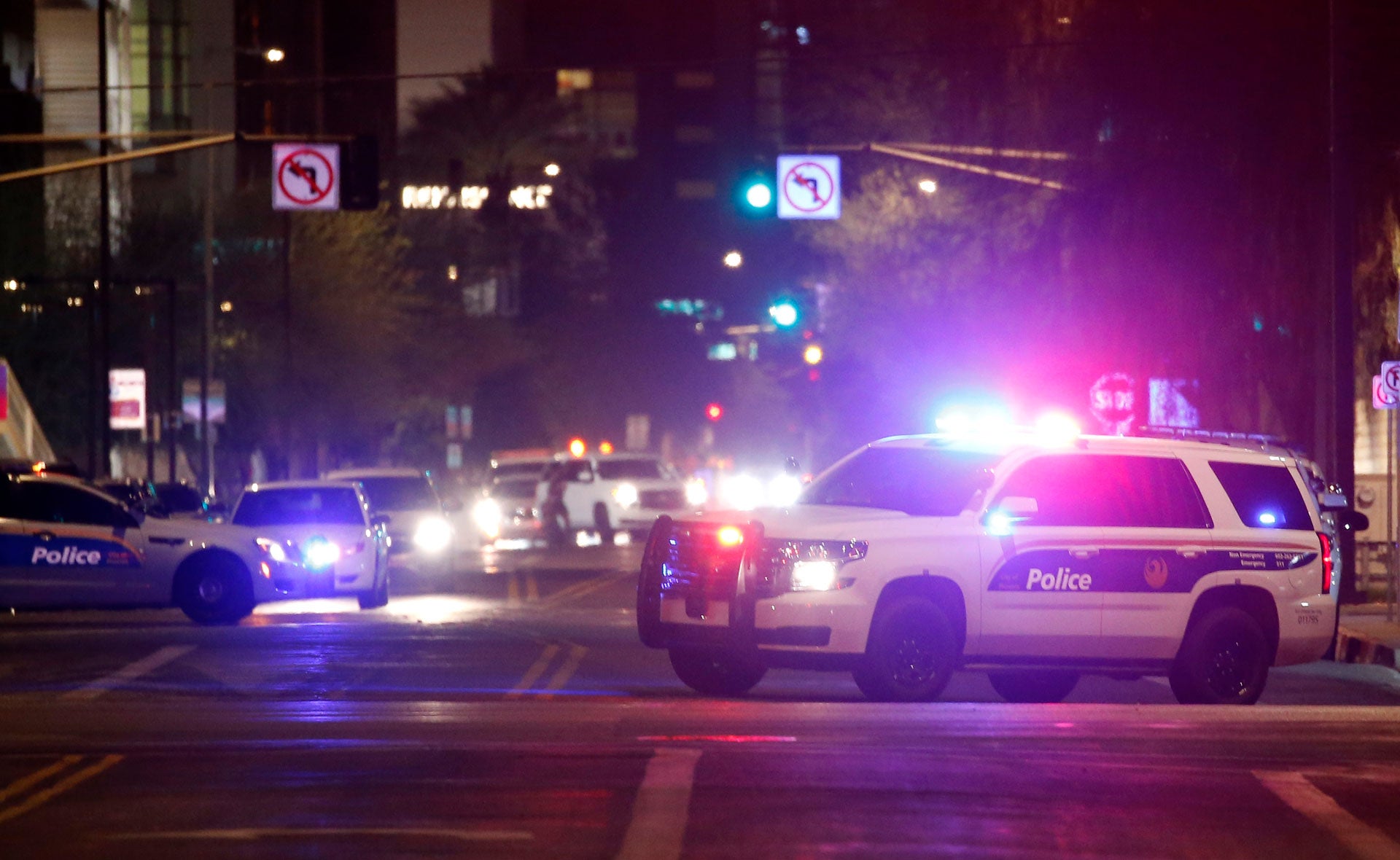 Phoenix Police Department vehicles block off a street in Phoenix, Arizona, May 30, 2020. 