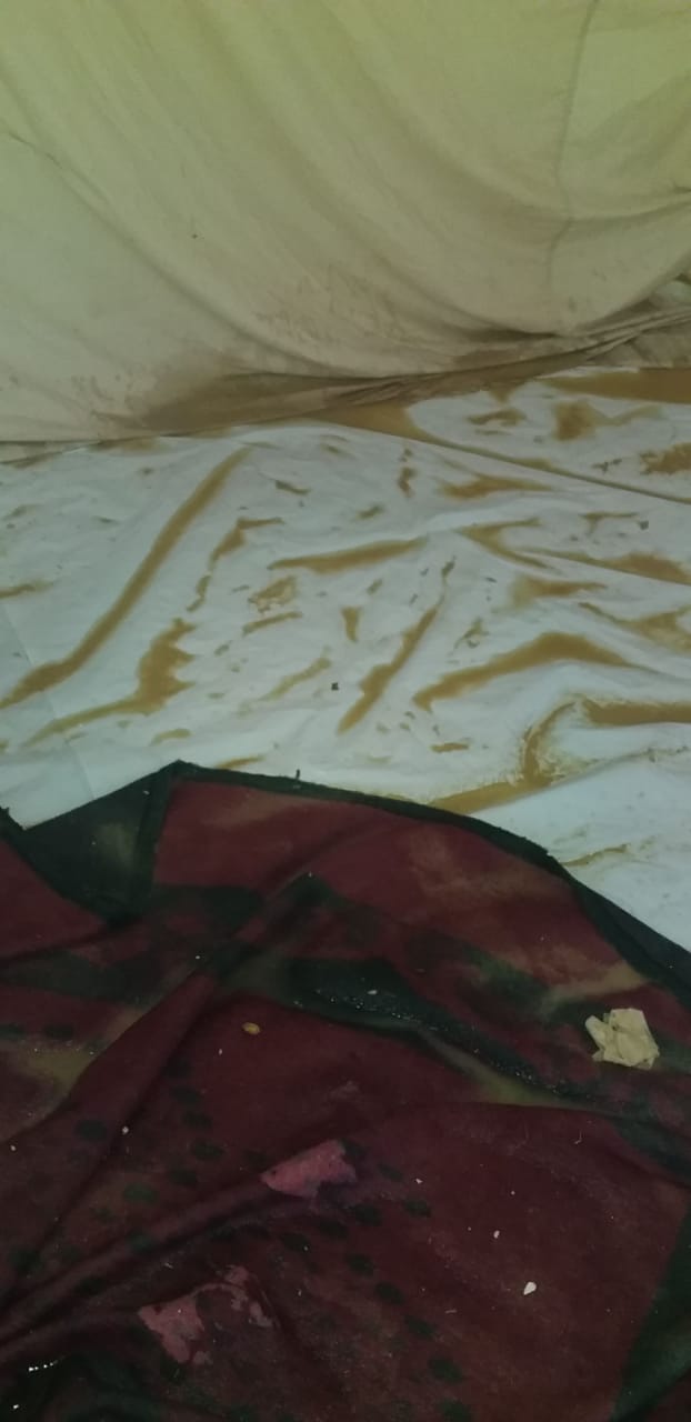 Mud and water in a family’s tent after it rained in Mavrovouni. 