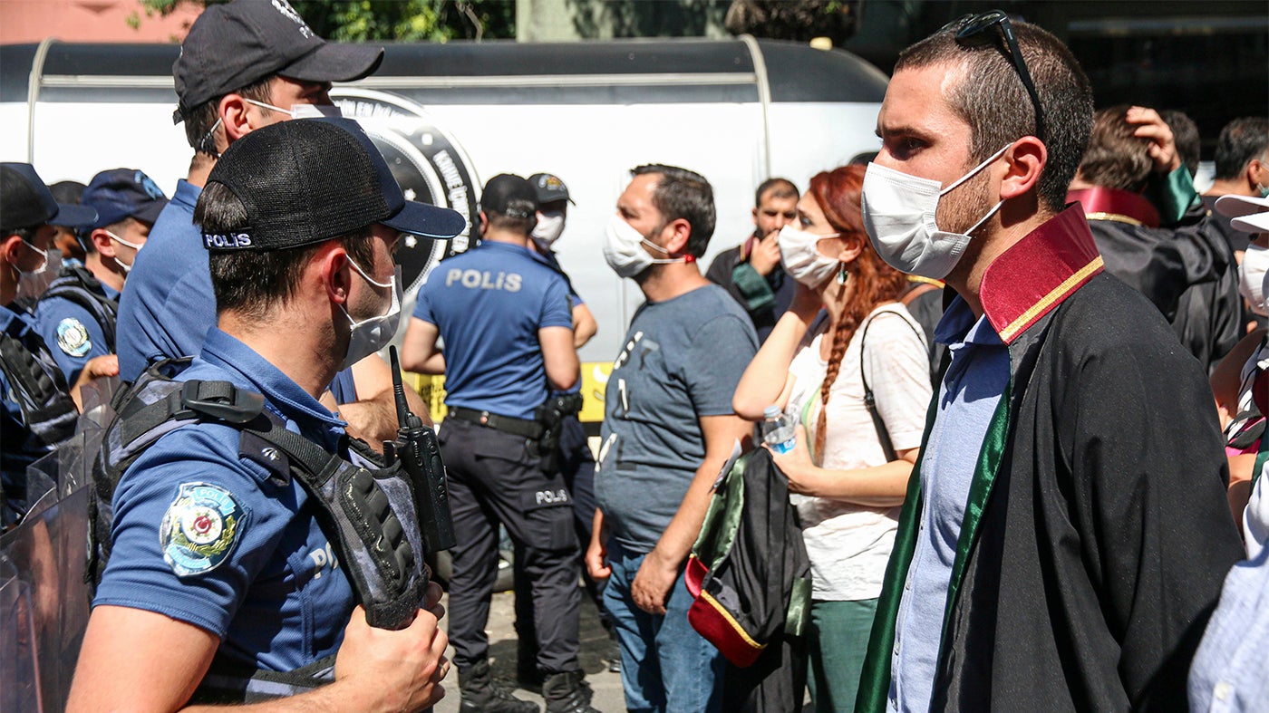 Police block protesting lawyers during a demonstration against a government draft bill to reduce the authority of Turkey’s leading bar associations. July 10, 2020, Ankara. 