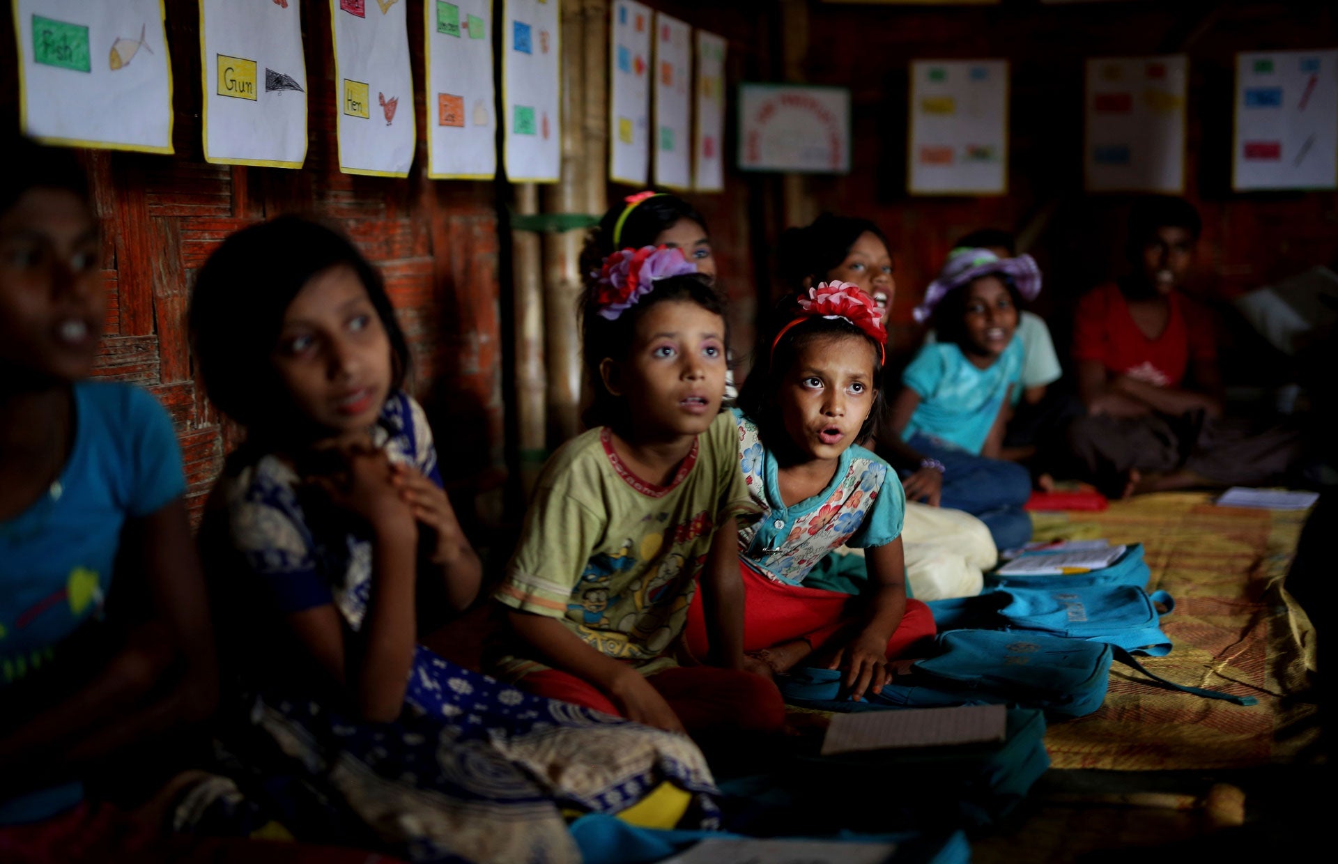 Rohingya refugee children attend a UNICEF run school in Balukhali refugee camp, Bangladesh, August 27, 2018. 
