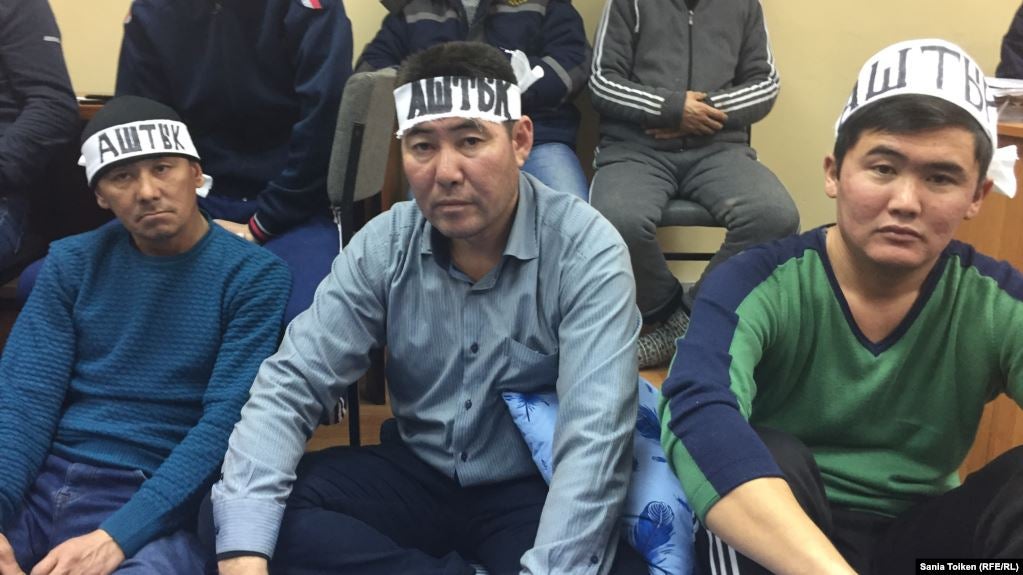 Kuspan Kosshygulov (center) is one of the workers at an oil construction company who went on a hunger strike demanding that Kazakhstan not liquidate the independent confederation of trade unions.