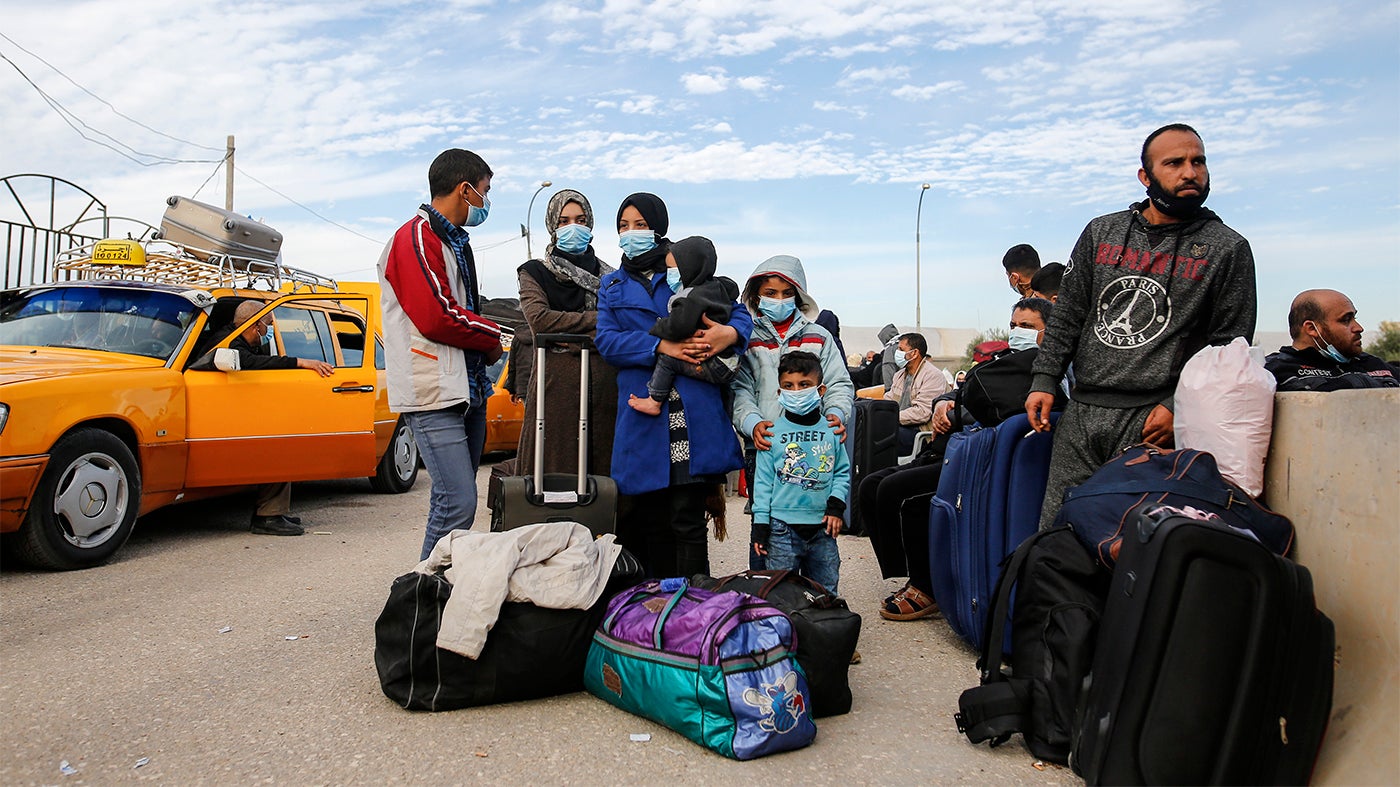 Palestinians wait to cross into Egypt at the Rafah crossing between Egypt and Gaza Strip in November 2020. Israeli and Egyptian authorities tightened their closure of Gaza amid the Covid-19 pandemic.