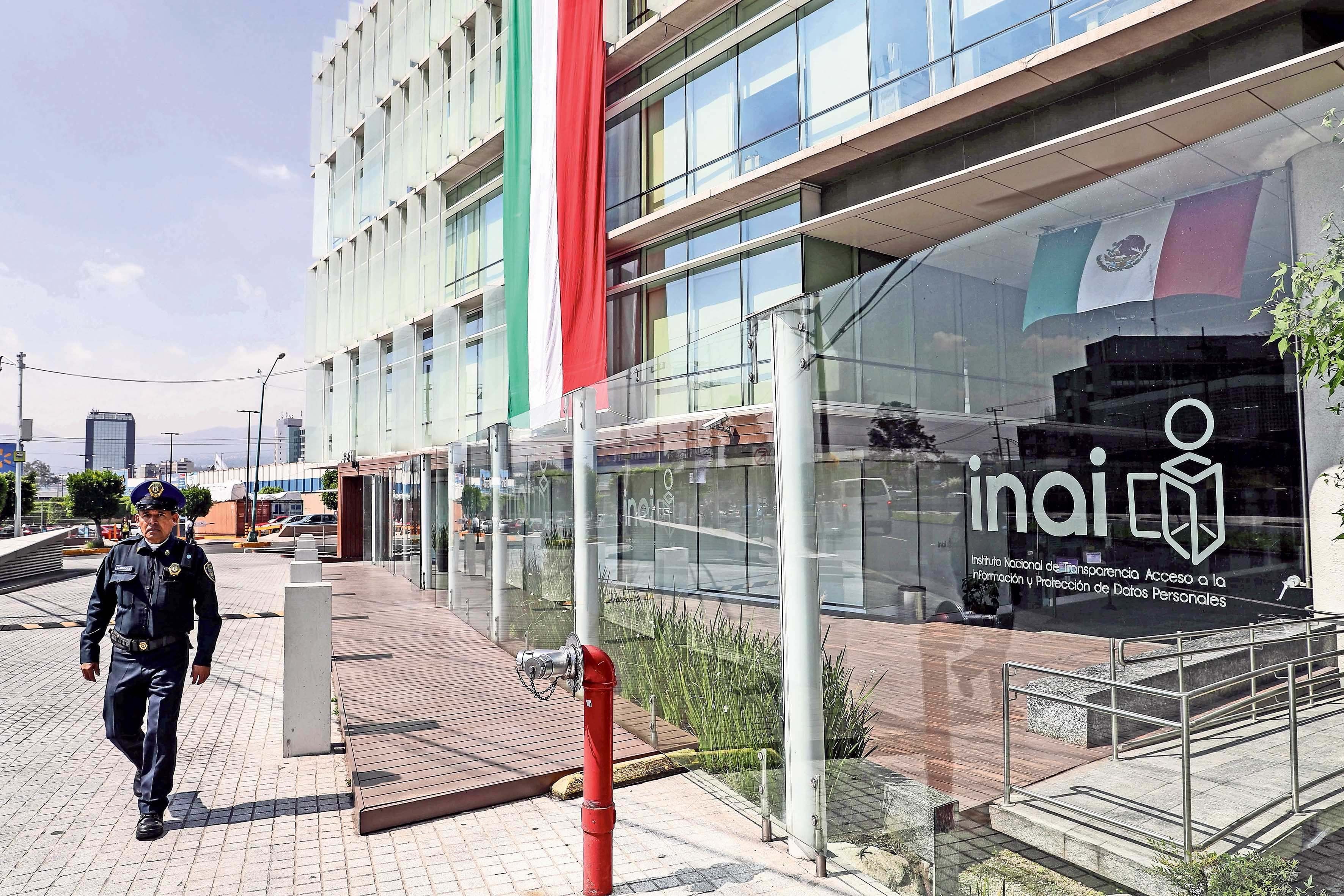 A police officer walks outside the offices of the National Institute for Transparency and Access to Information and Data Protection (INAI) in Mexico City, Mexico.