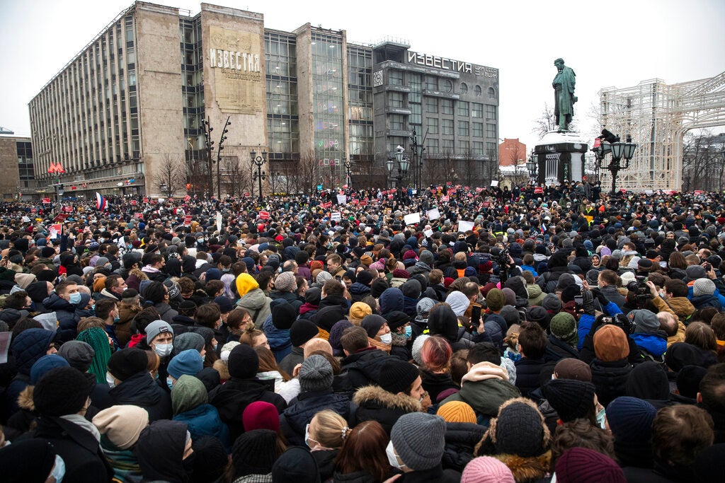 People gather in Pushkin Square during a protest against the jailing of opposition leader Alexei Navalny in Moscow, Russia, Saturday, January 23, 2021. 