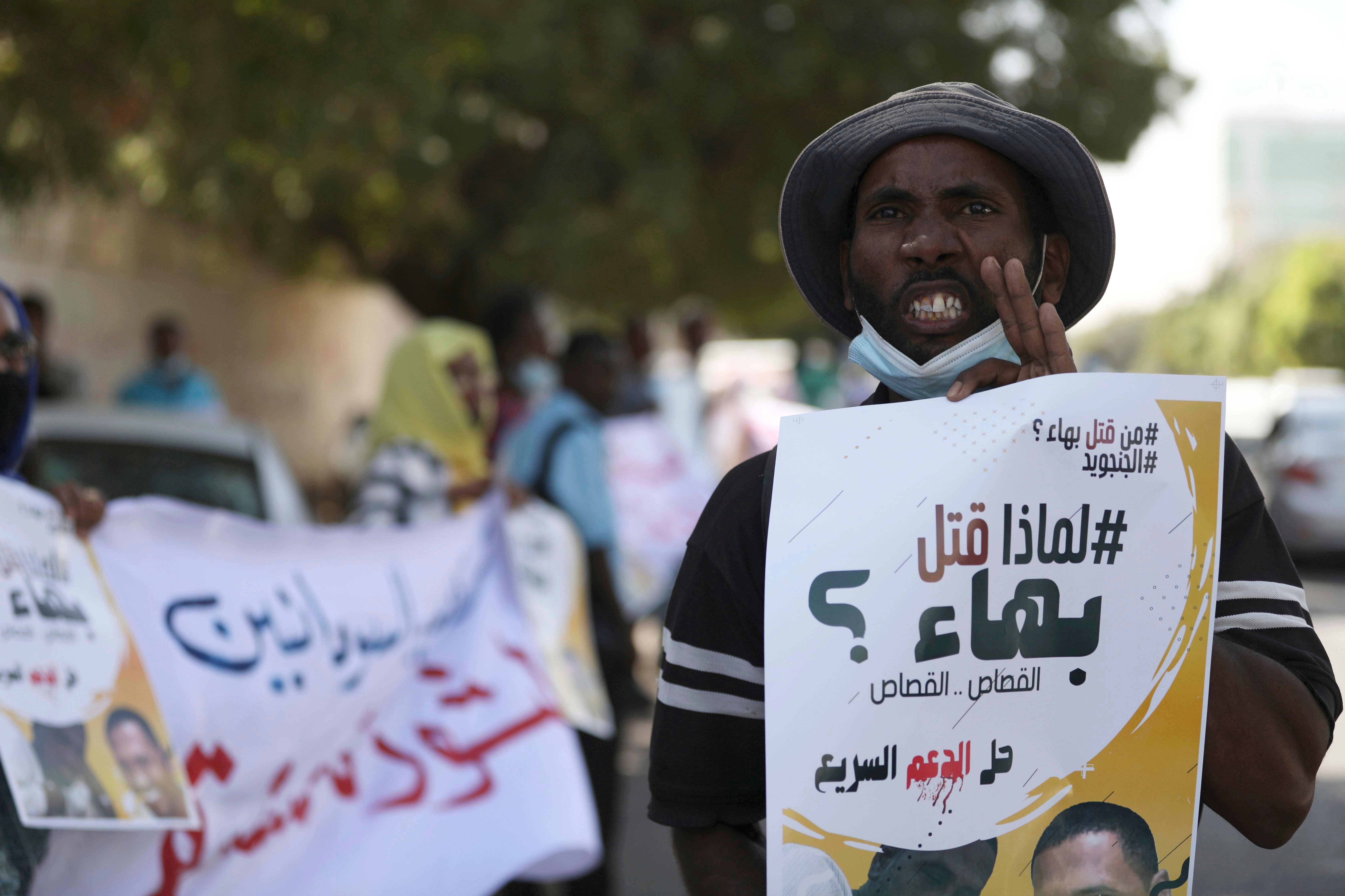 Protesters gather demanding the closure of the headquarters of Rapid Support Forces in Khartoum, Sudan, Thursday, January 14, 2021.