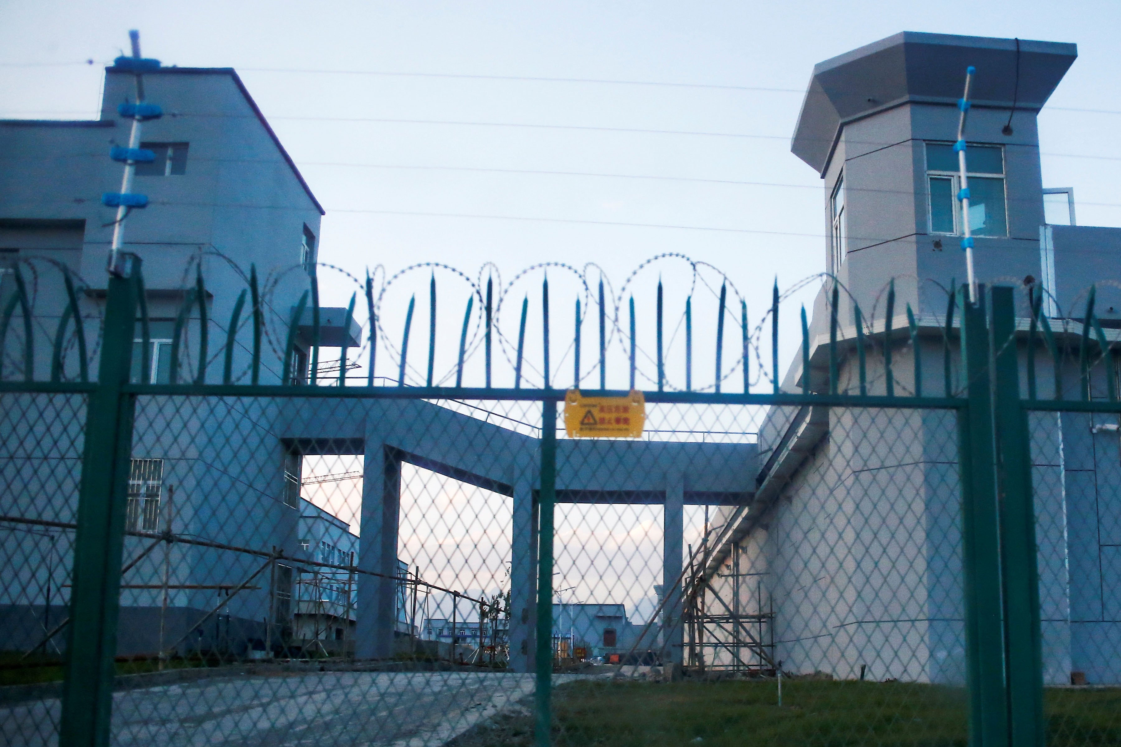 A perimeter fence around what is officially known as a” vocational skills education center” in Dabancheng in China's Xinjiang region, September 2018. 