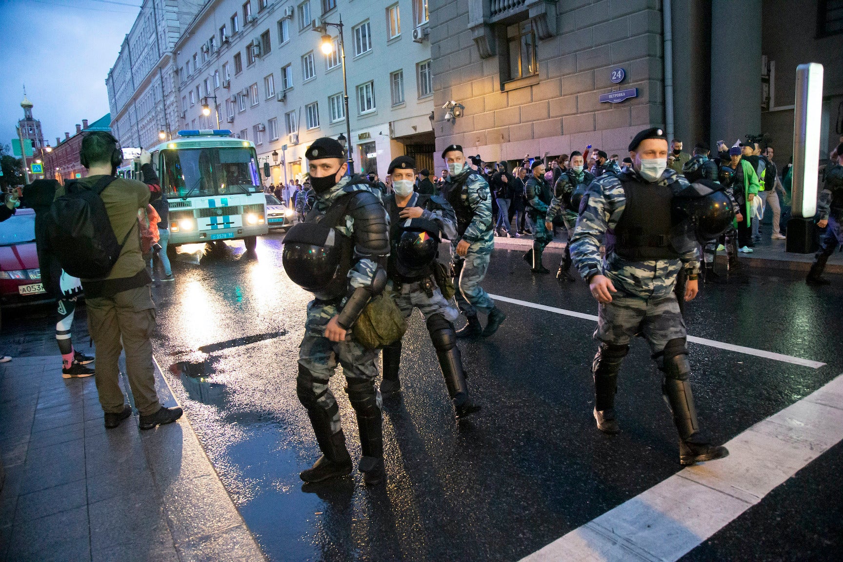 Police officers block a road in Russia’s capital