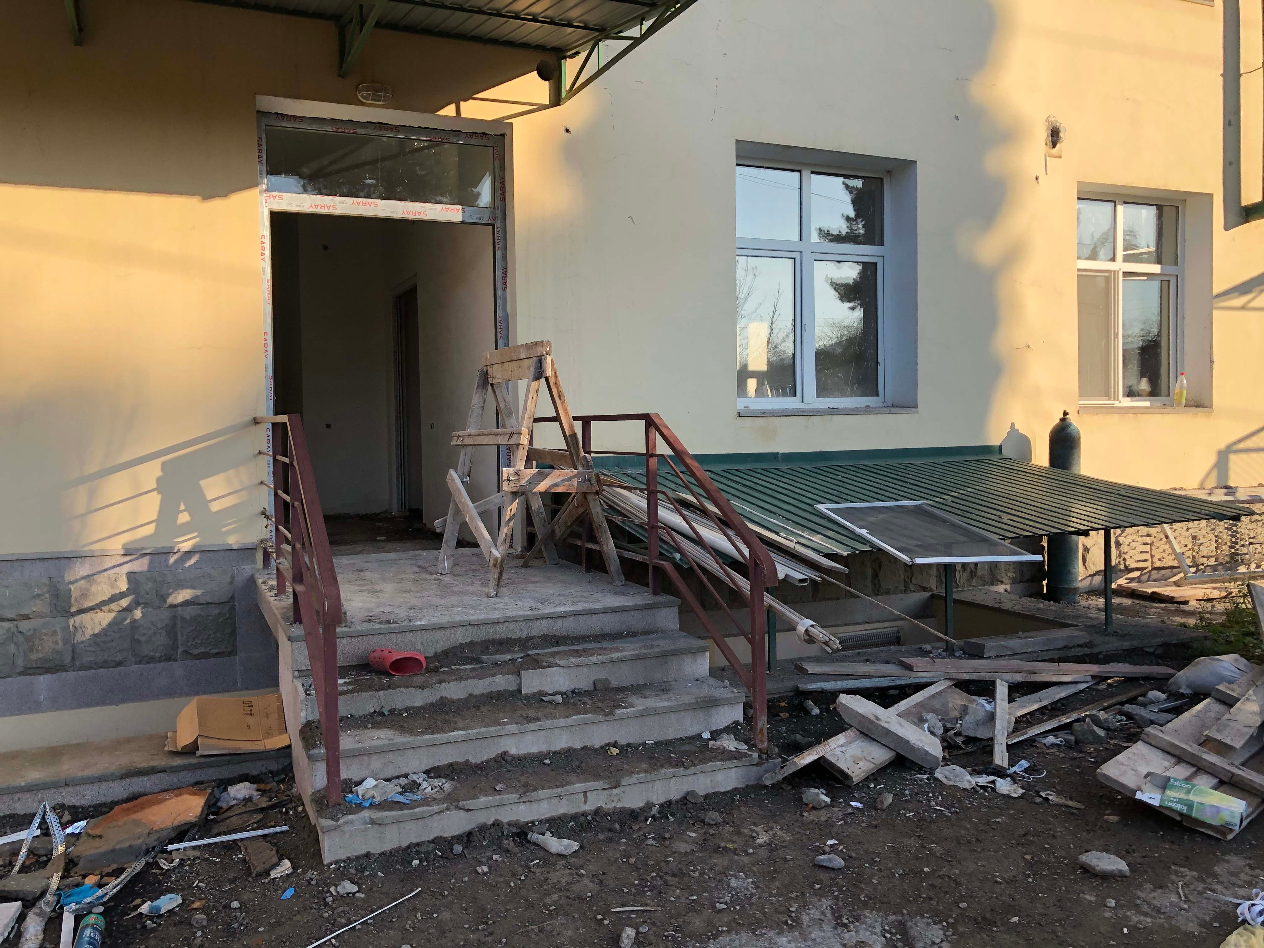 The front entrance to the public hospital in Martakert, which suffered significant damage as a result of multiple strikes by Azerbaijani forces between September and November 2020.