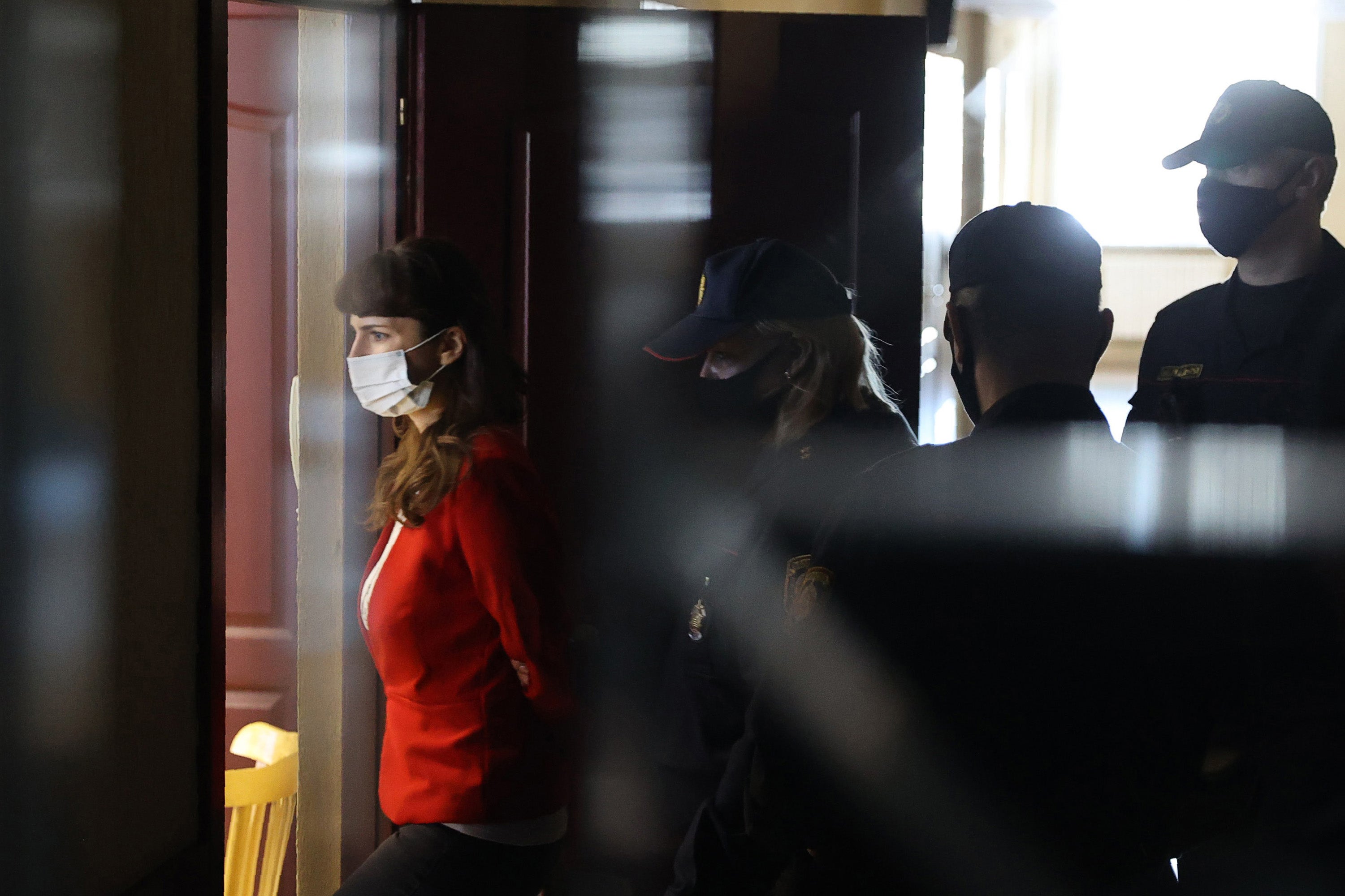 Katsiaryna Barysevich, a journalist for the independent TUT.BY news website enters a court room during a trial in Minsk on 19 February, 2021. 