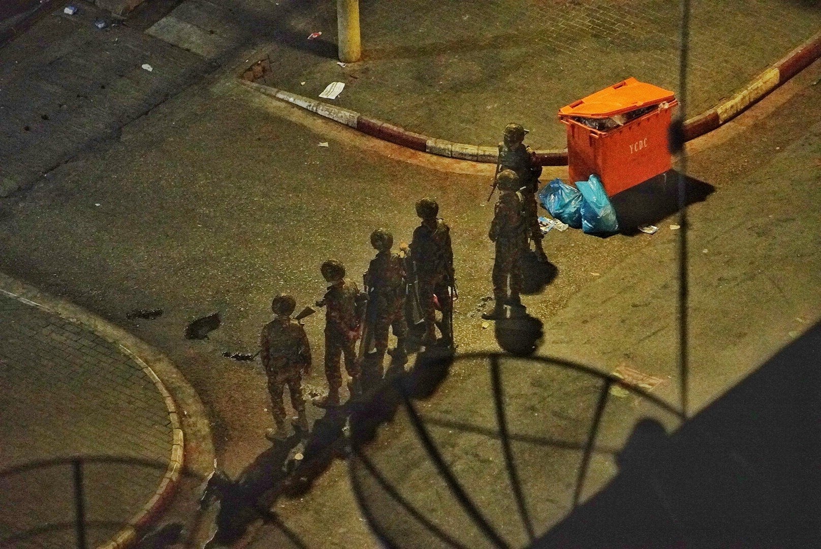 Myanmar soldiers blocking the street in Yangon near the home of Khin Maung Latt on the night of his arrest, March 6, 2021. (c) 2021 Private