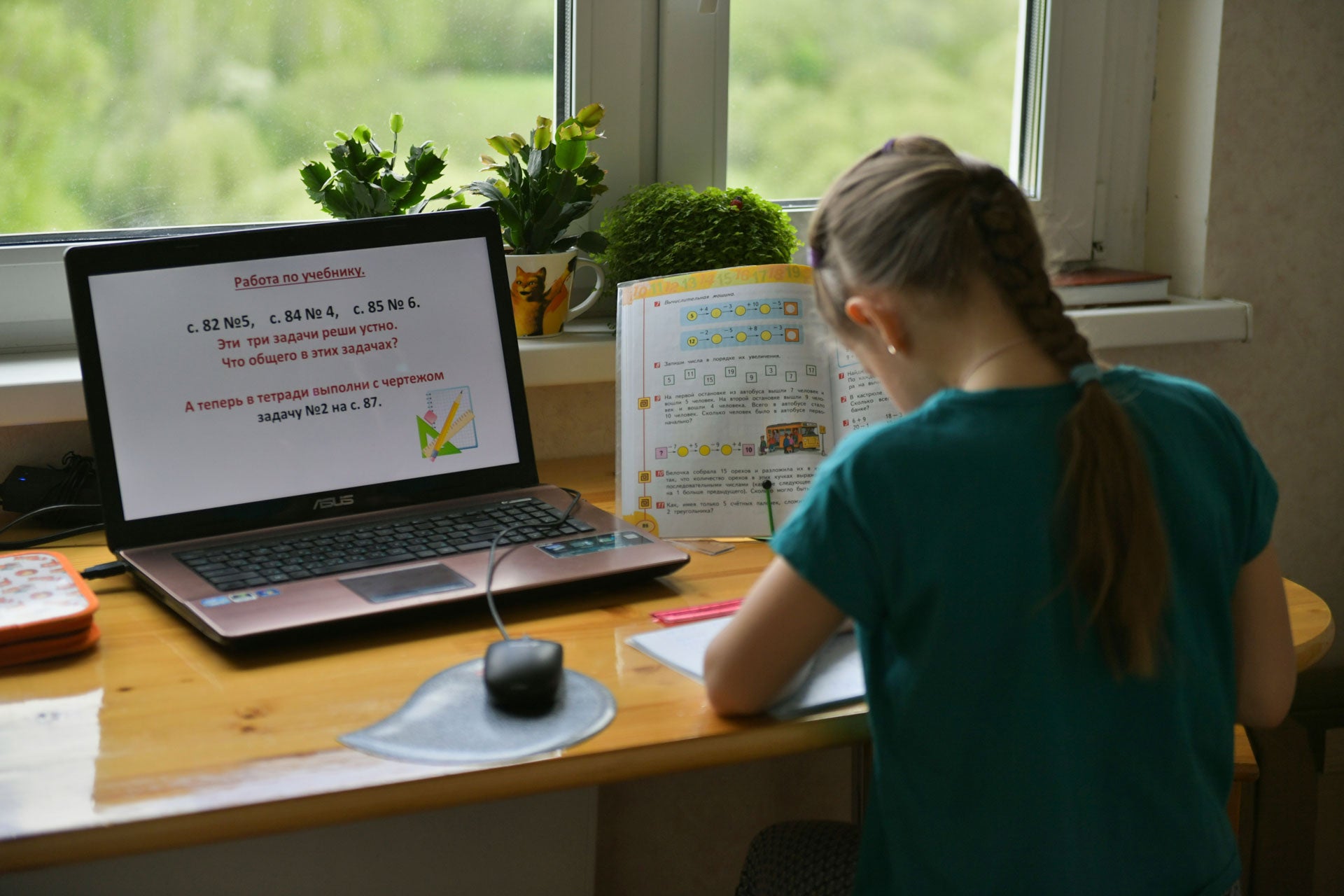 A girl studies from home because of the coronavirus outbreak in Moscow, Russia,