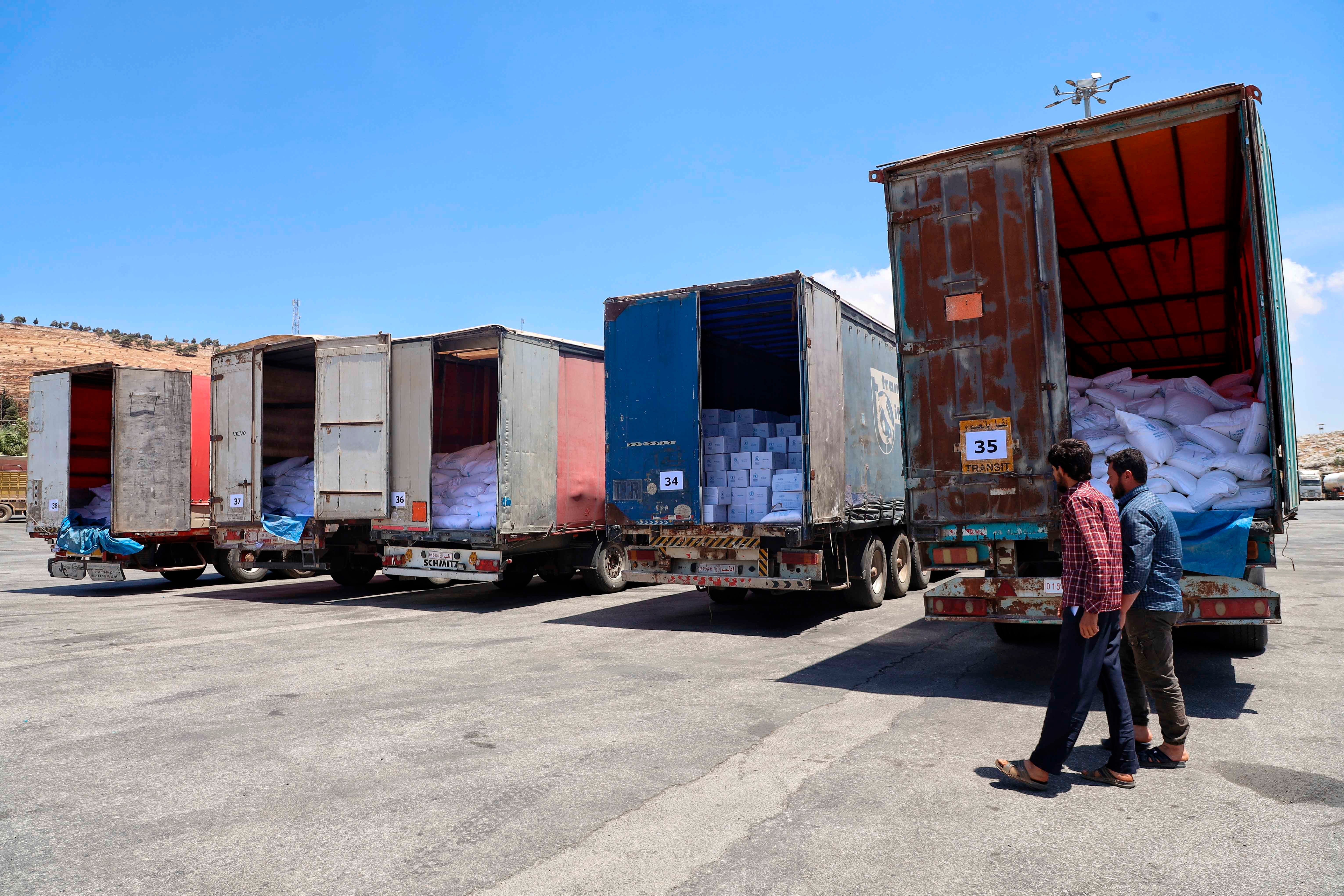 UN humanitarian aid trucks enter northwest Syria through the Bab al-Hawa border crossing with Turkey on June 1, 2021