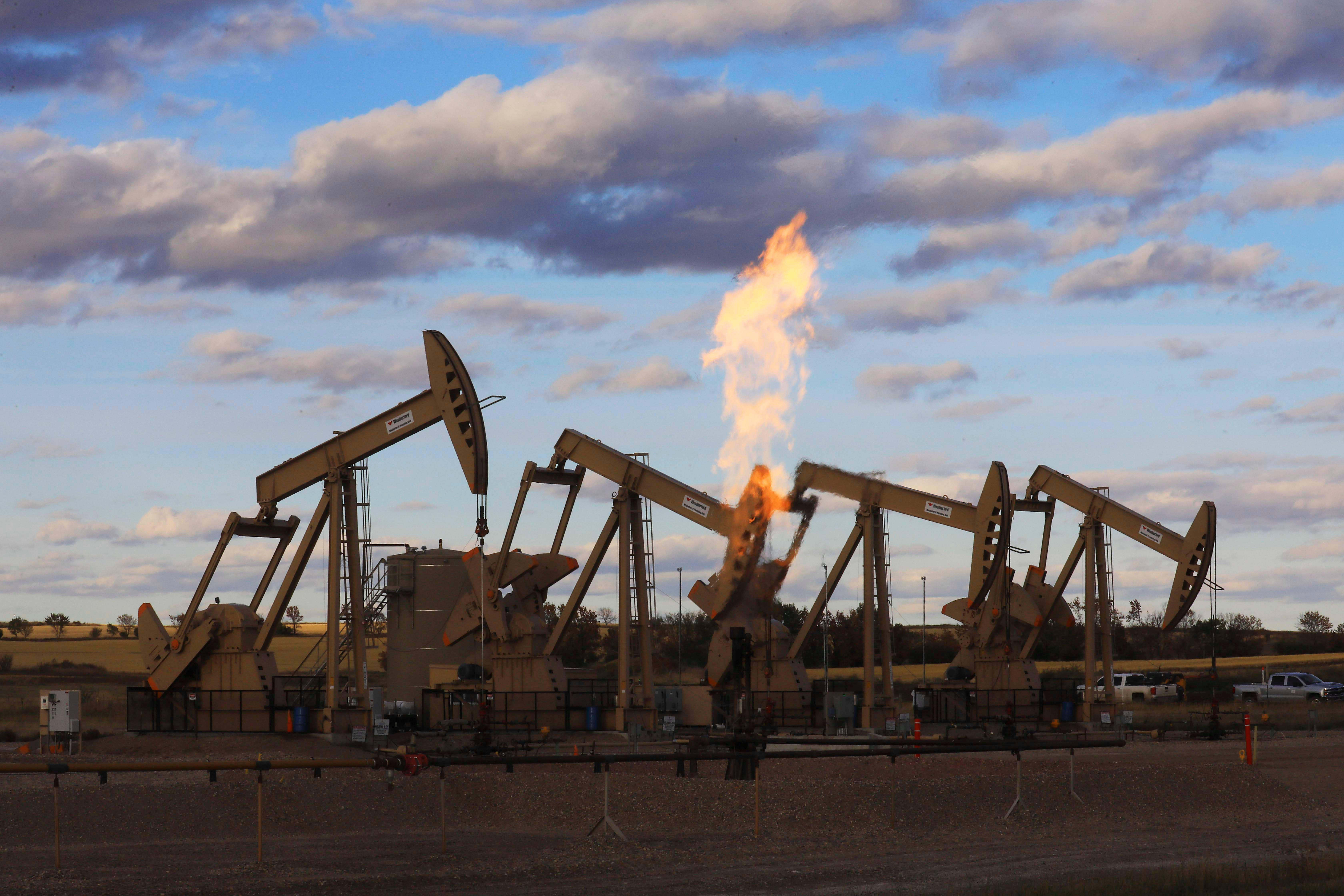 Pumpjacks at an oil well site near Epping, N.D., Oct. 1, 2018. © 2018 Jim Wilson/The New York Times/GDA via AP Images