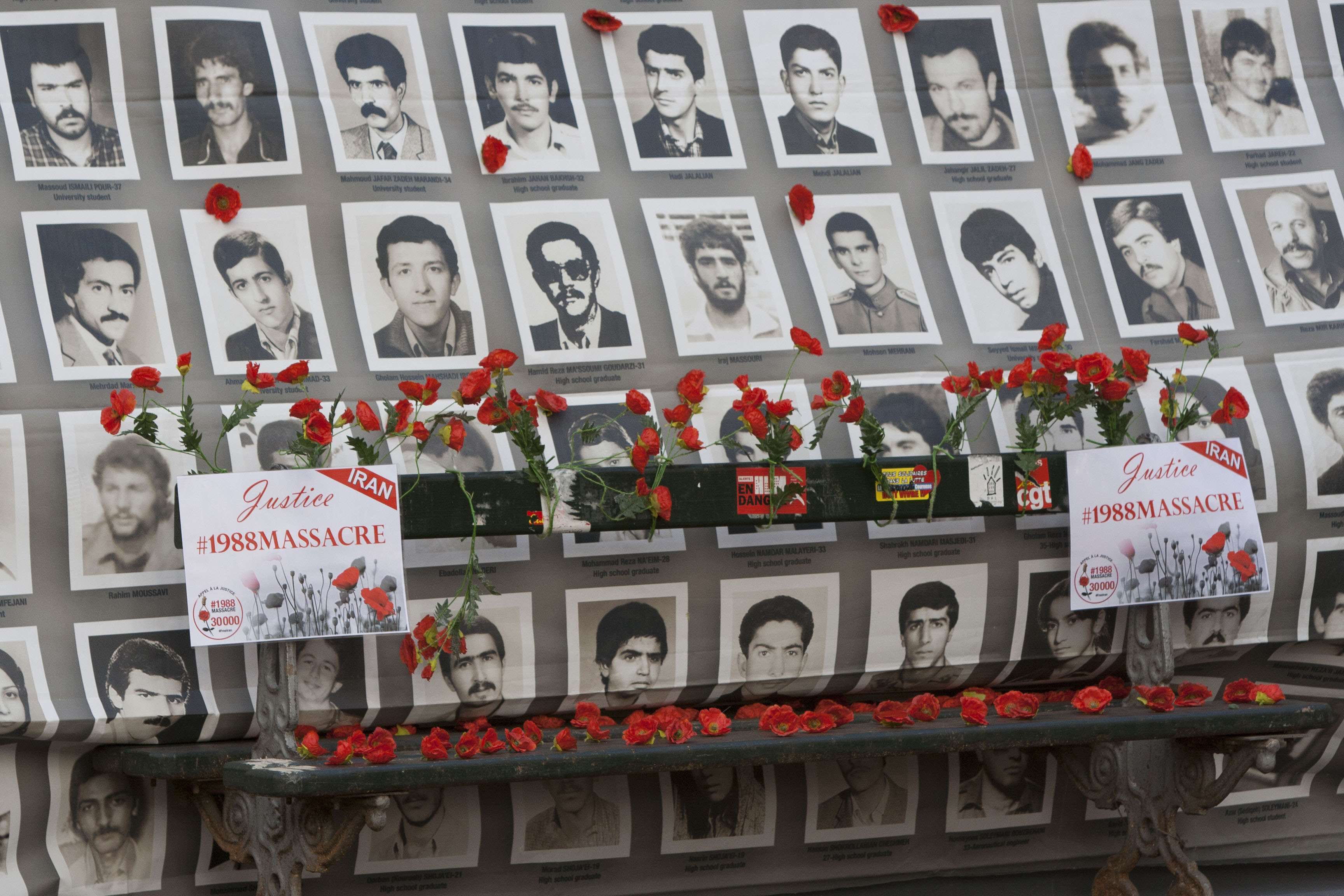 A human rights exhibition on Iran during the international campaign to demand justice for the victims of the 1988 massacre, held near the French National Assembly in Paris, November 14, 2017.