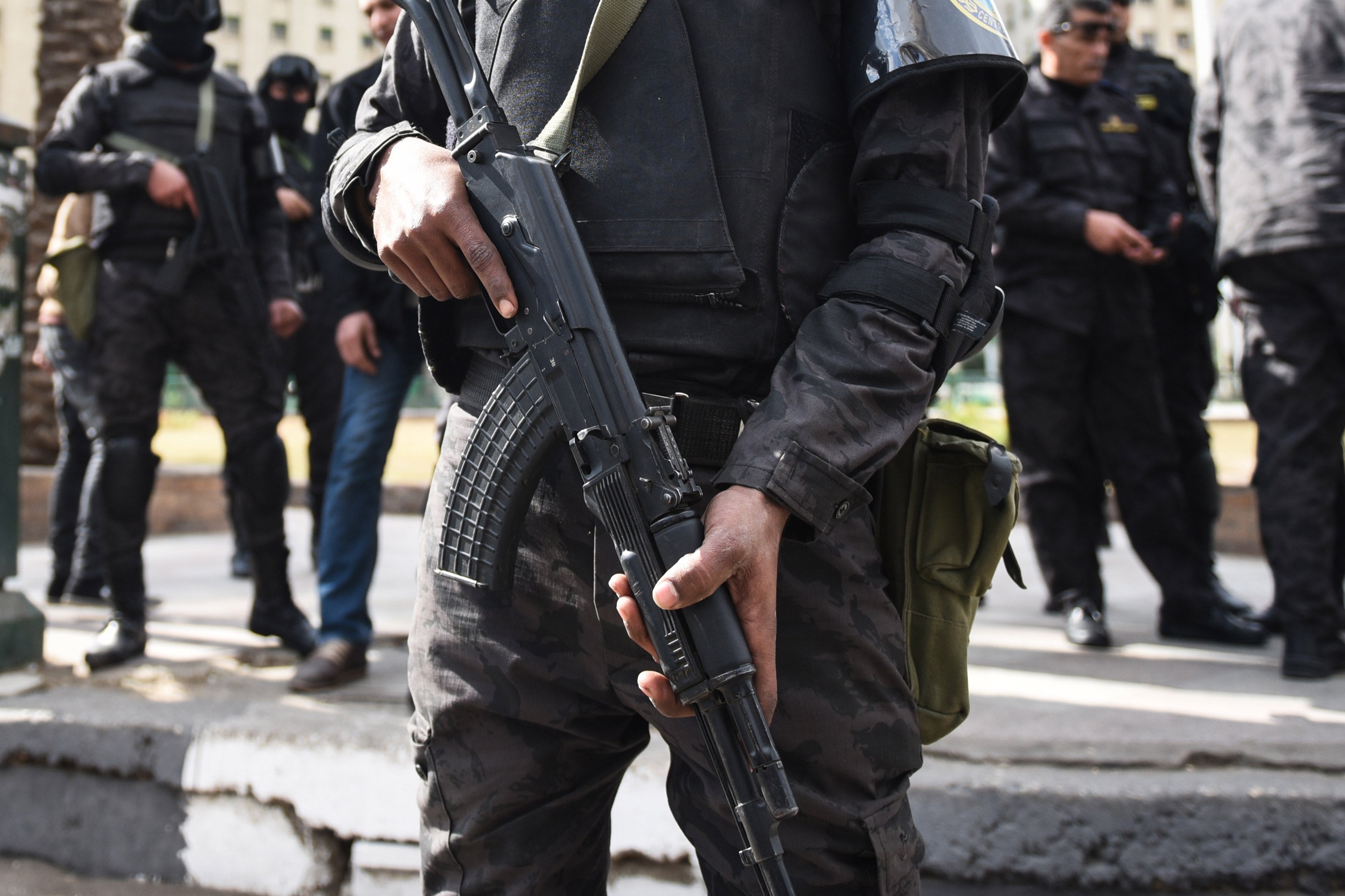 A security officer holding a weapon