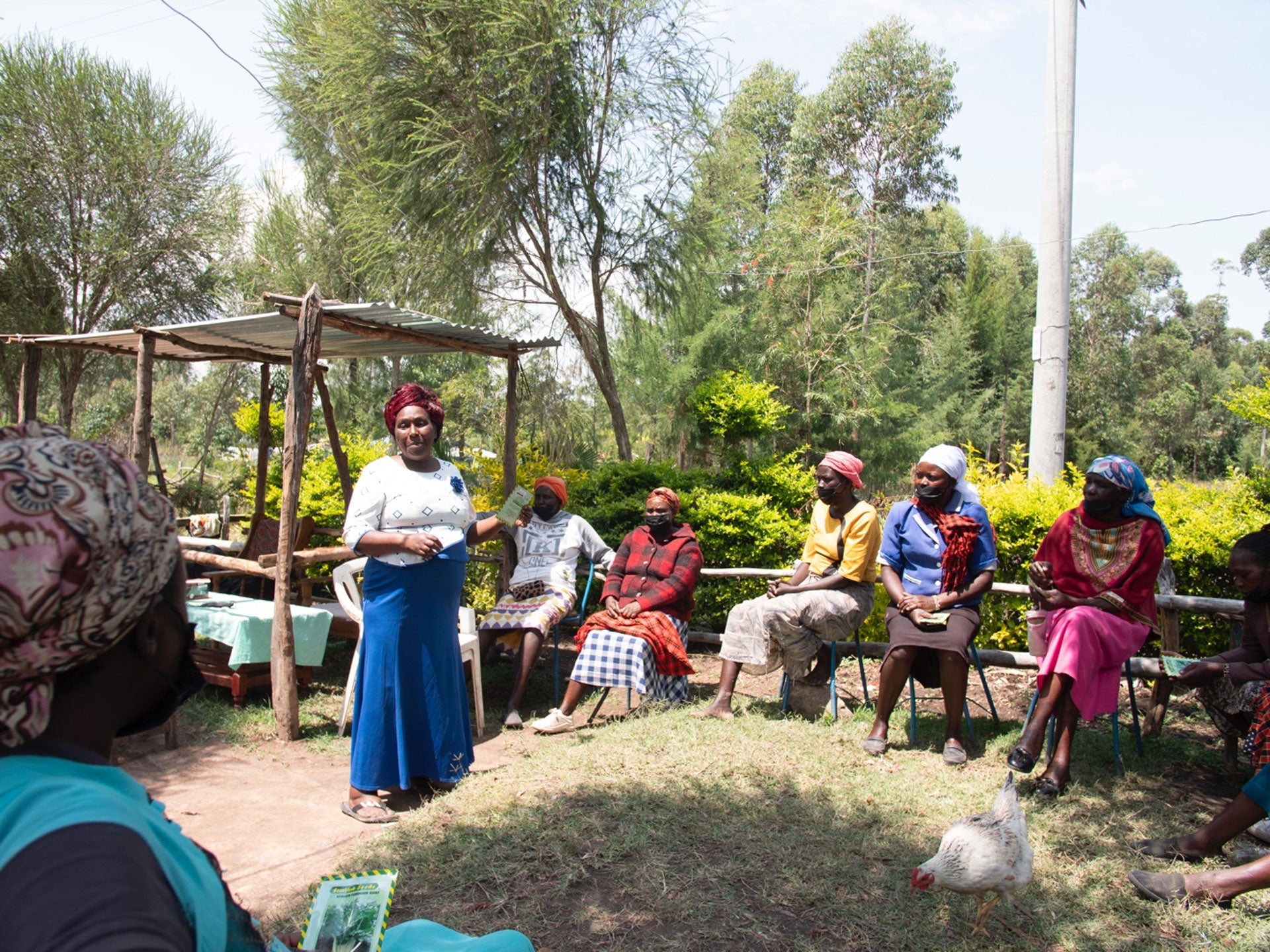 Community activist Gladys Koskey speaks during a meeting with women in her home in Narok, Kenya.