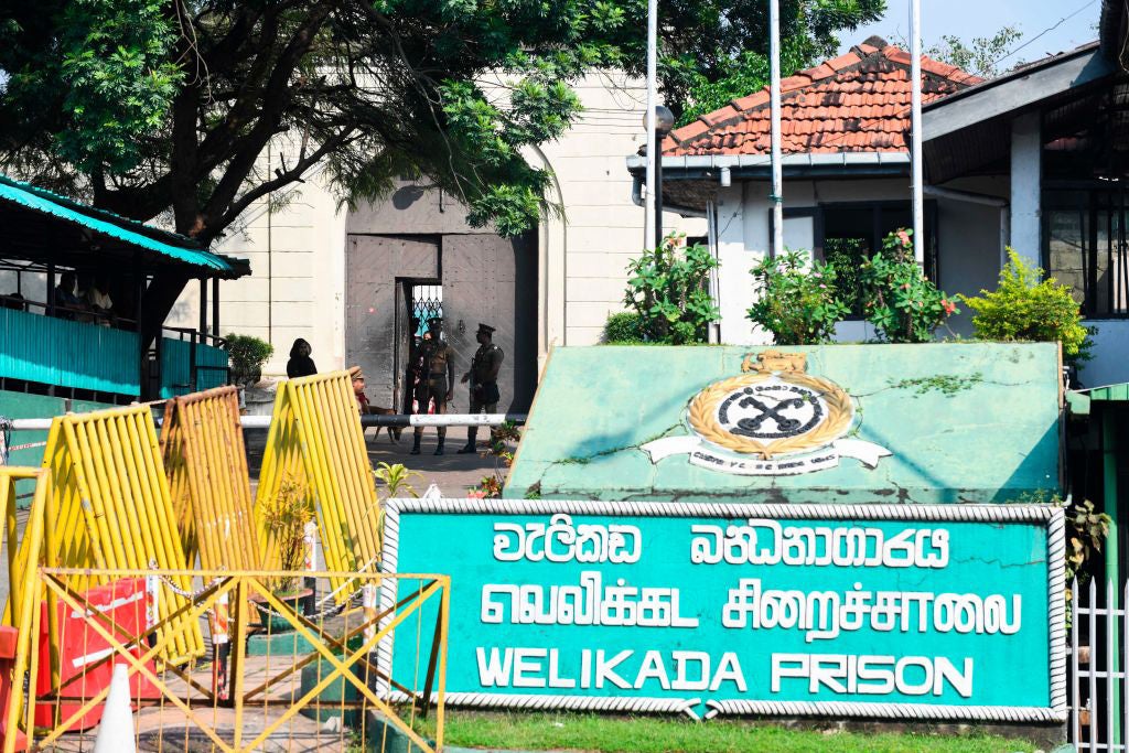 Prison guards at the main entrance of Welikada prison in Colombo, Sri Lanka, November 2019.