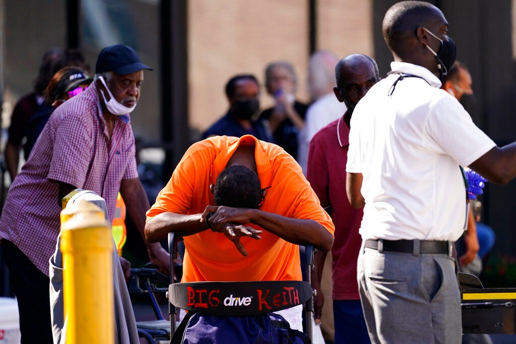 Occupants prepare to depart the Renaissance Place senior living apartments in the aftermath of Hurricane Ida on September 3, 2021, in New Orleans, Louisiana. 