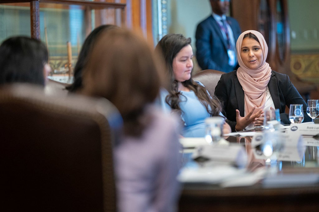 Hina Naveed, DACA recipient, discusses the urgent need for a pathway to citizenship with US Vice President Kamala Harris and other DACA recipients, Thursday, July 22, 2021, at the White House. 