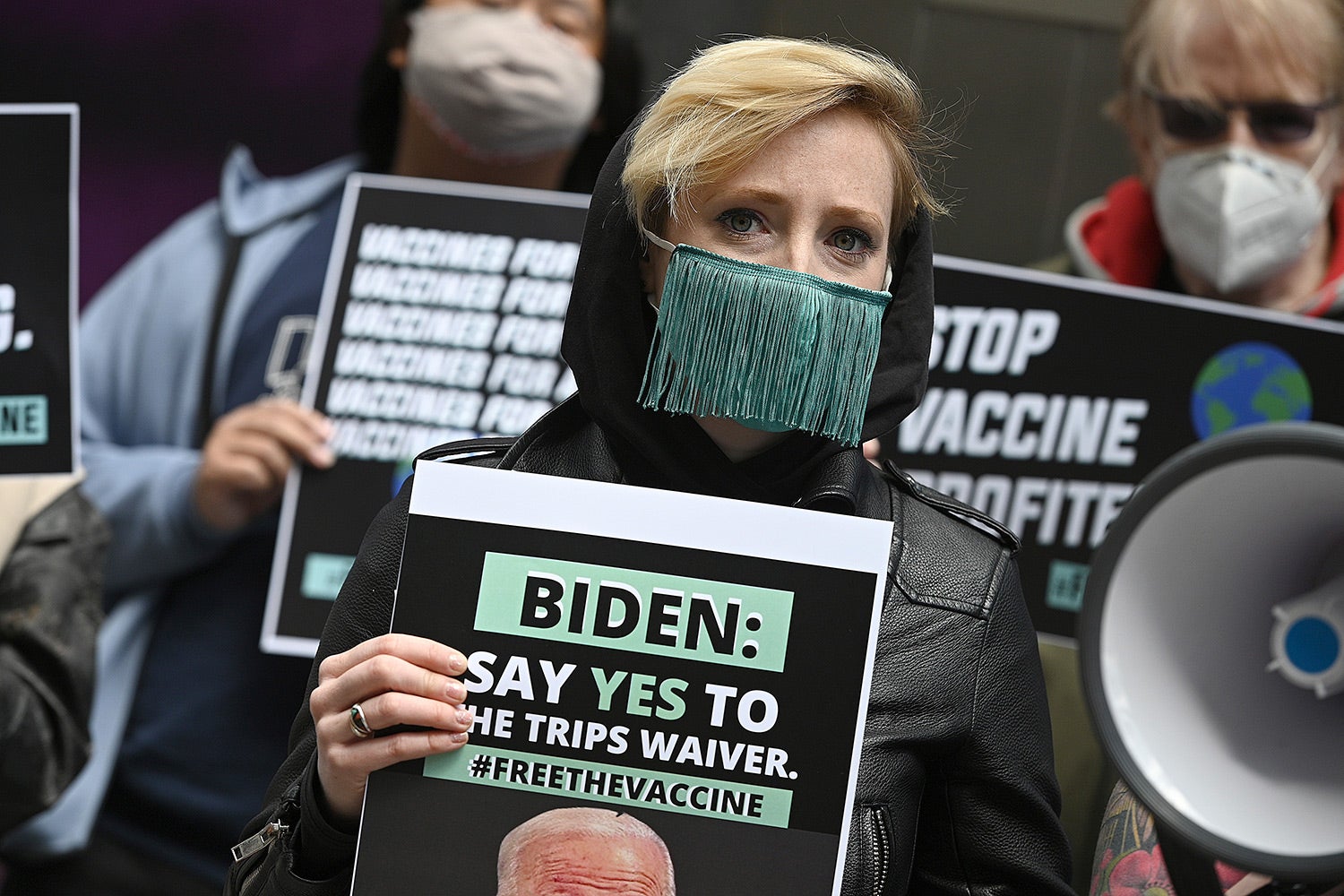 Activists stand outside Pfizer Headquarters demanding US President Joe Biden support the "TRIPS Waiver" in New York, NY on April 22, 2021.