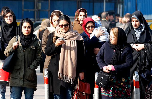 Iranian women walk down a street in the capital Tehran on February 7, 2018.