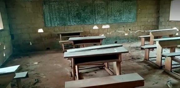 Desks in an abandoned classroom