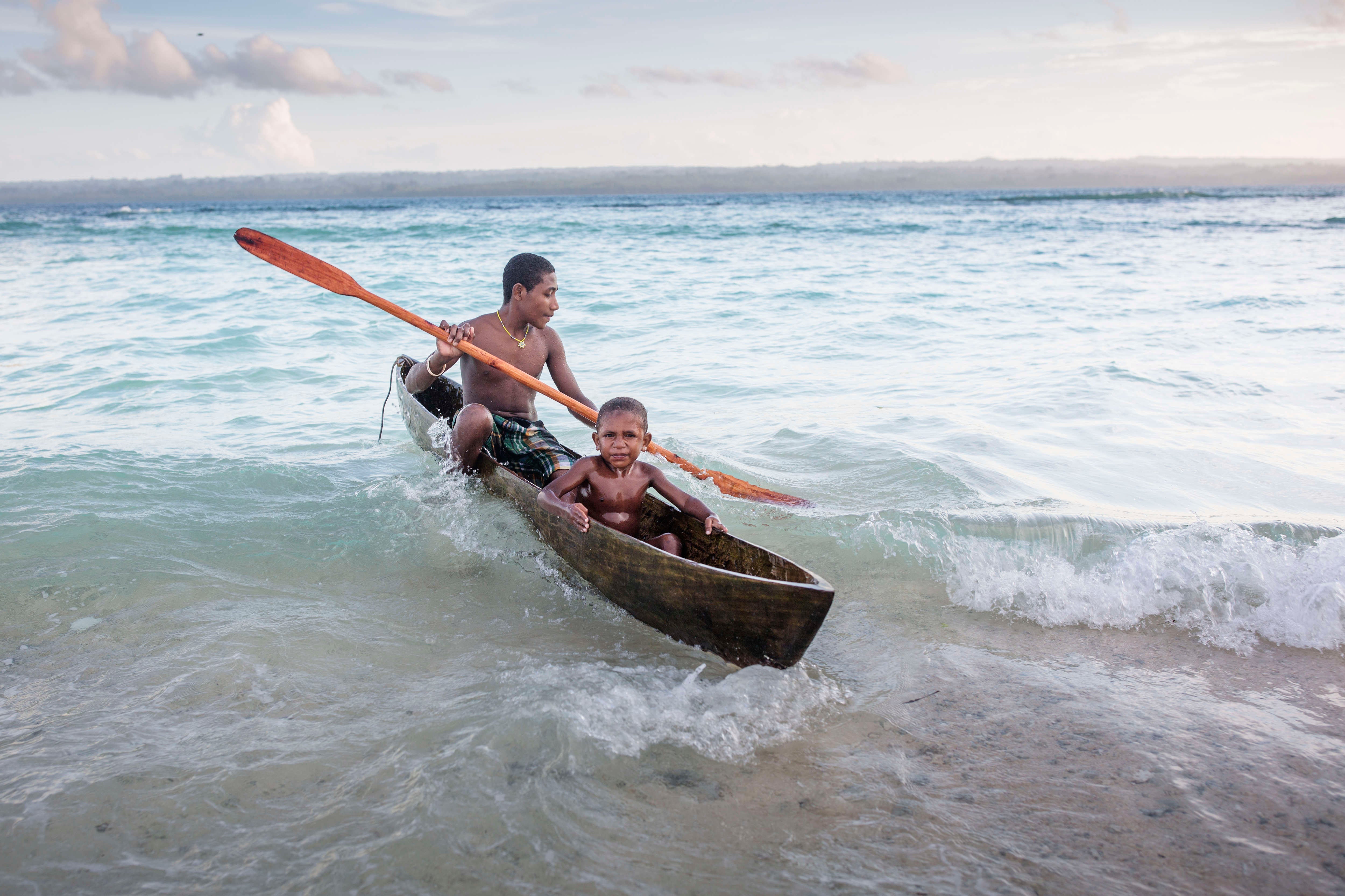 Two boys in a canoe