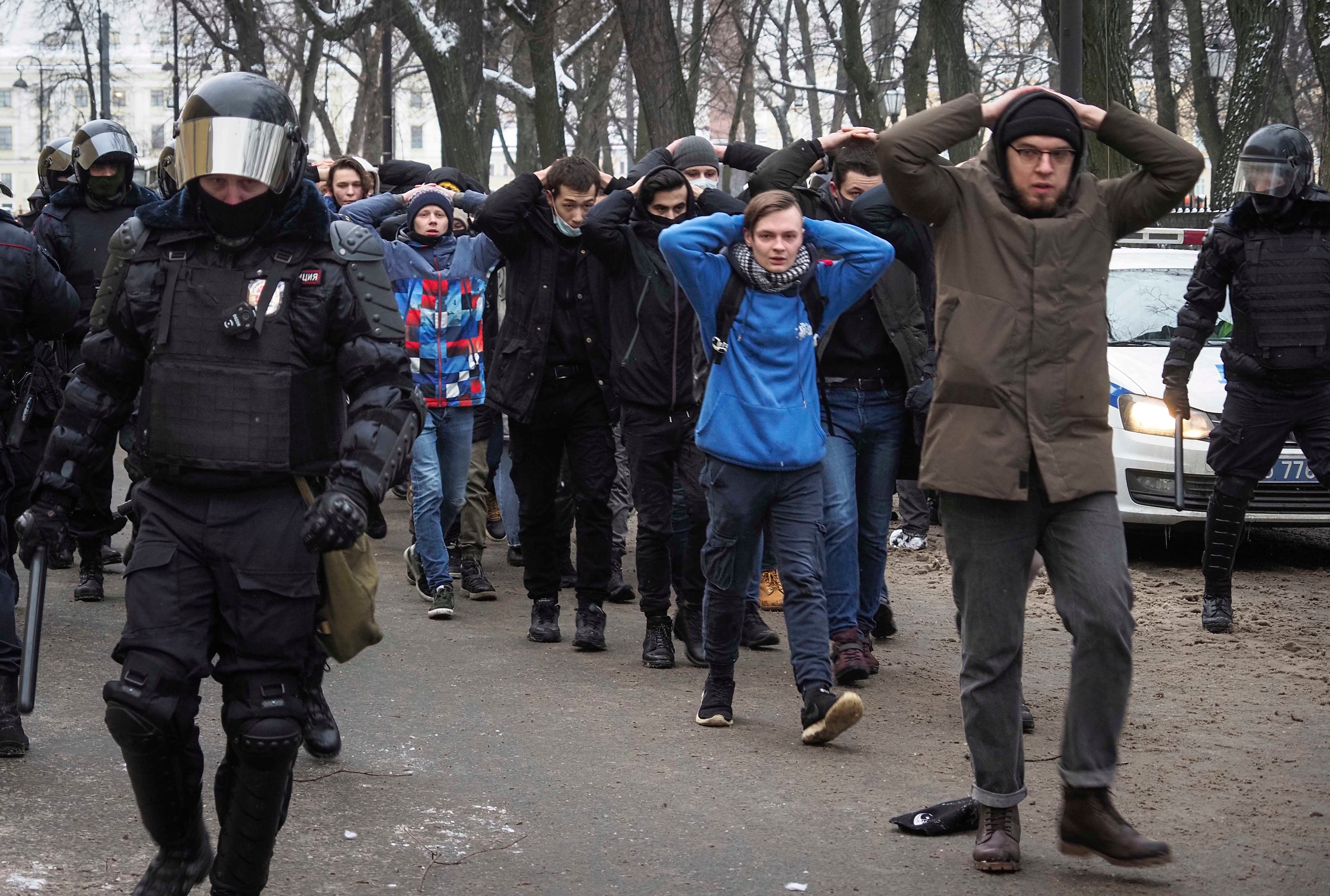 Police detain protesters at a rally against the jailing of opposition leader Alexei Navalny in St. Petersburg, January 31, 2021.