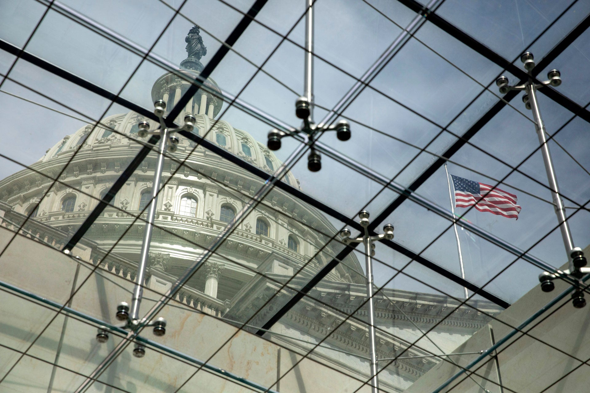 The dome of the US Capitol seen through a glass ceiling in Washington, DC, April 29, 2021.