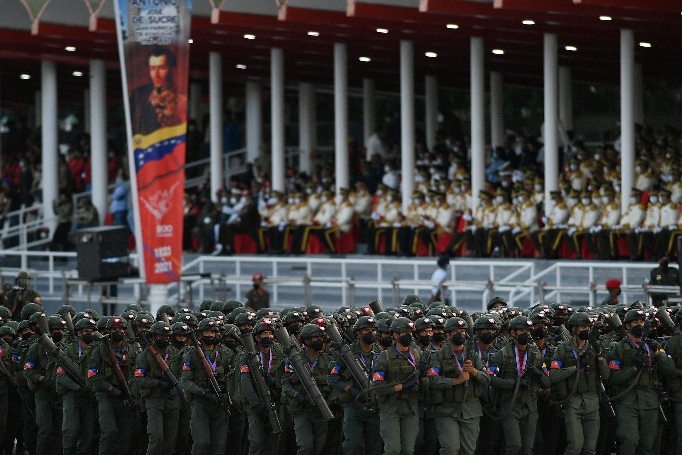 Soldiers march during a military parade marking Independence Day in Caracas, Venezuela, Monday, July 5, 2021. (AP Photo/Matias Delacroix)