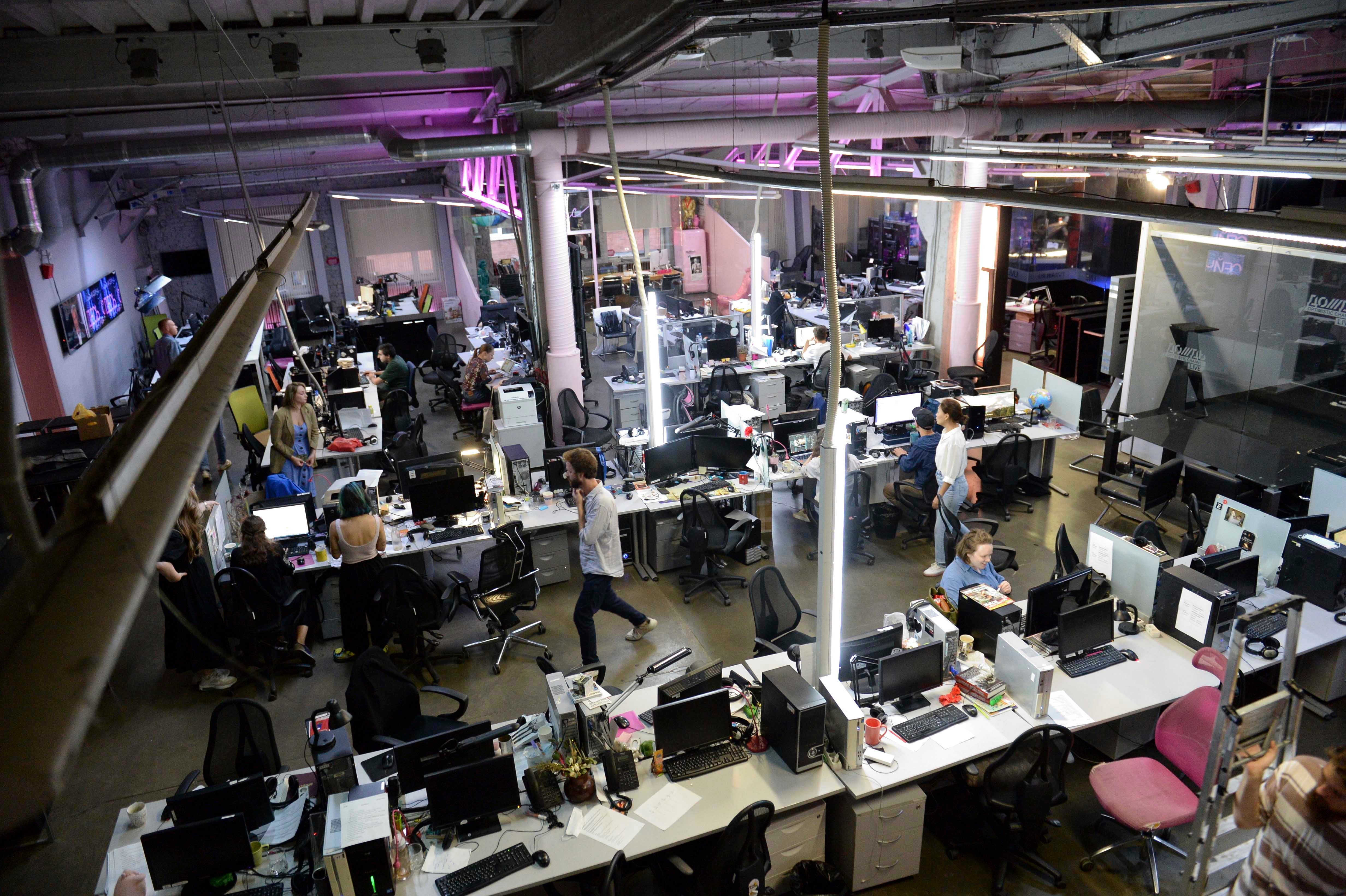 Journalists work in the news room of the independent Dozhd (Rain) television channel in Moscow, Russia.