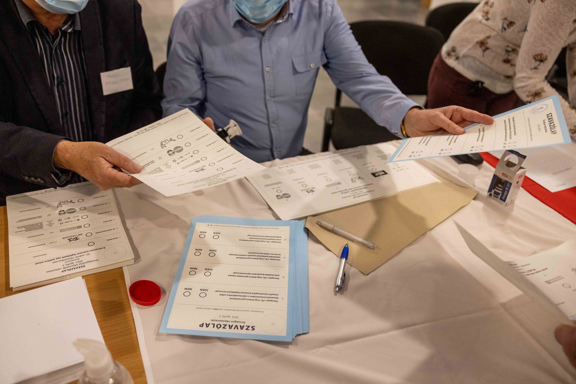 Ballot papers are seen on a table during the general parliamentary elections in Budapest, Hungary