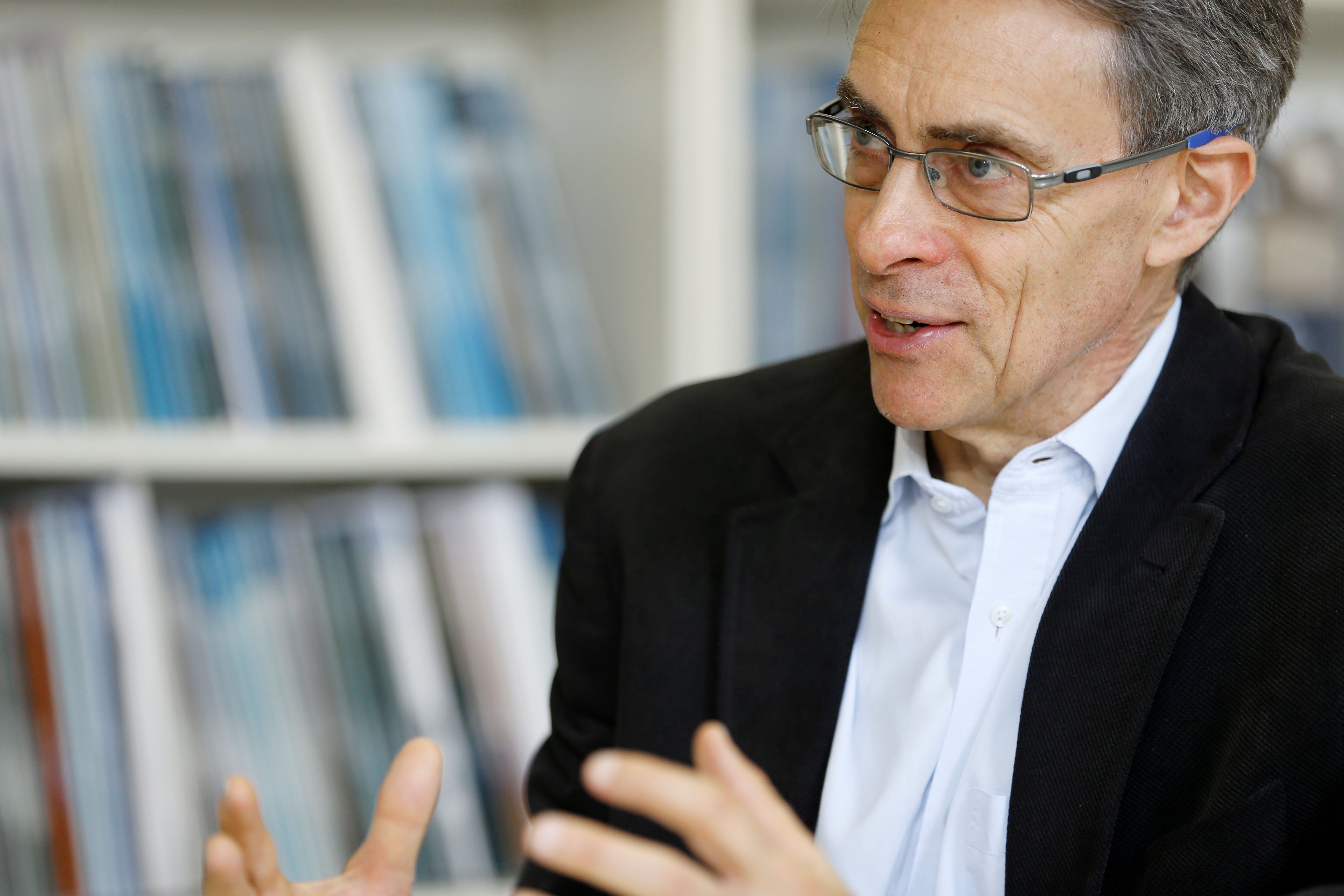 Human Rights Watch Executive Director Kenneth Roth speaks during an interview