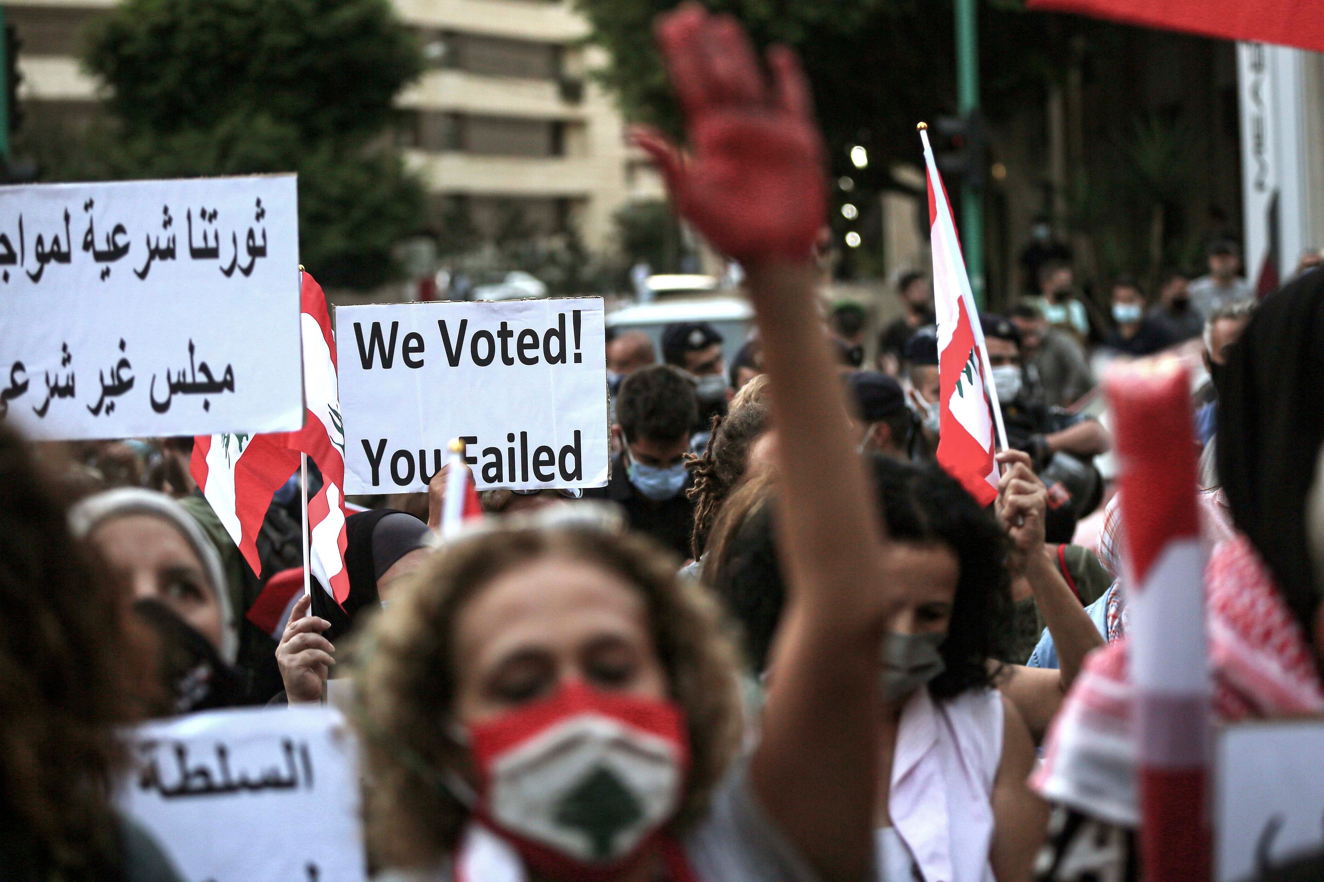 Activists chant slogans demanding the end of corruption