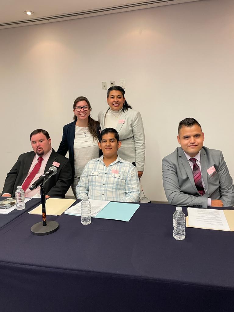 A group of Mexican activists with intellectual disabilities poses for a photo.