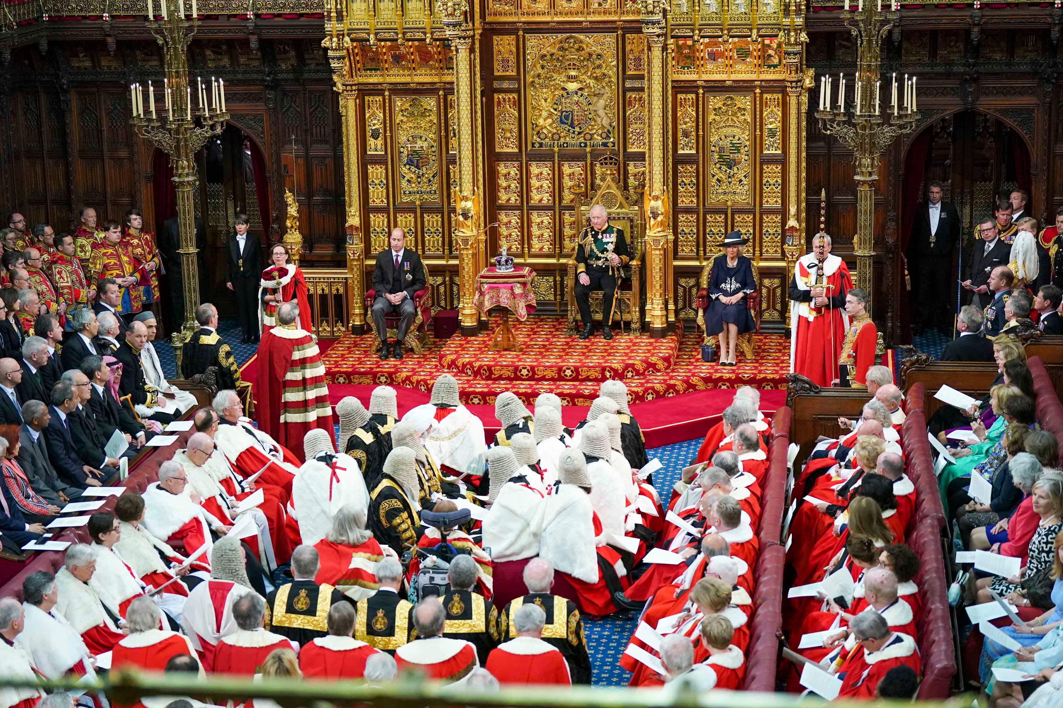 Prince Charles reads the Queen's speech next to her crown during the State Opening of Parliament, at the Palace of Westminster