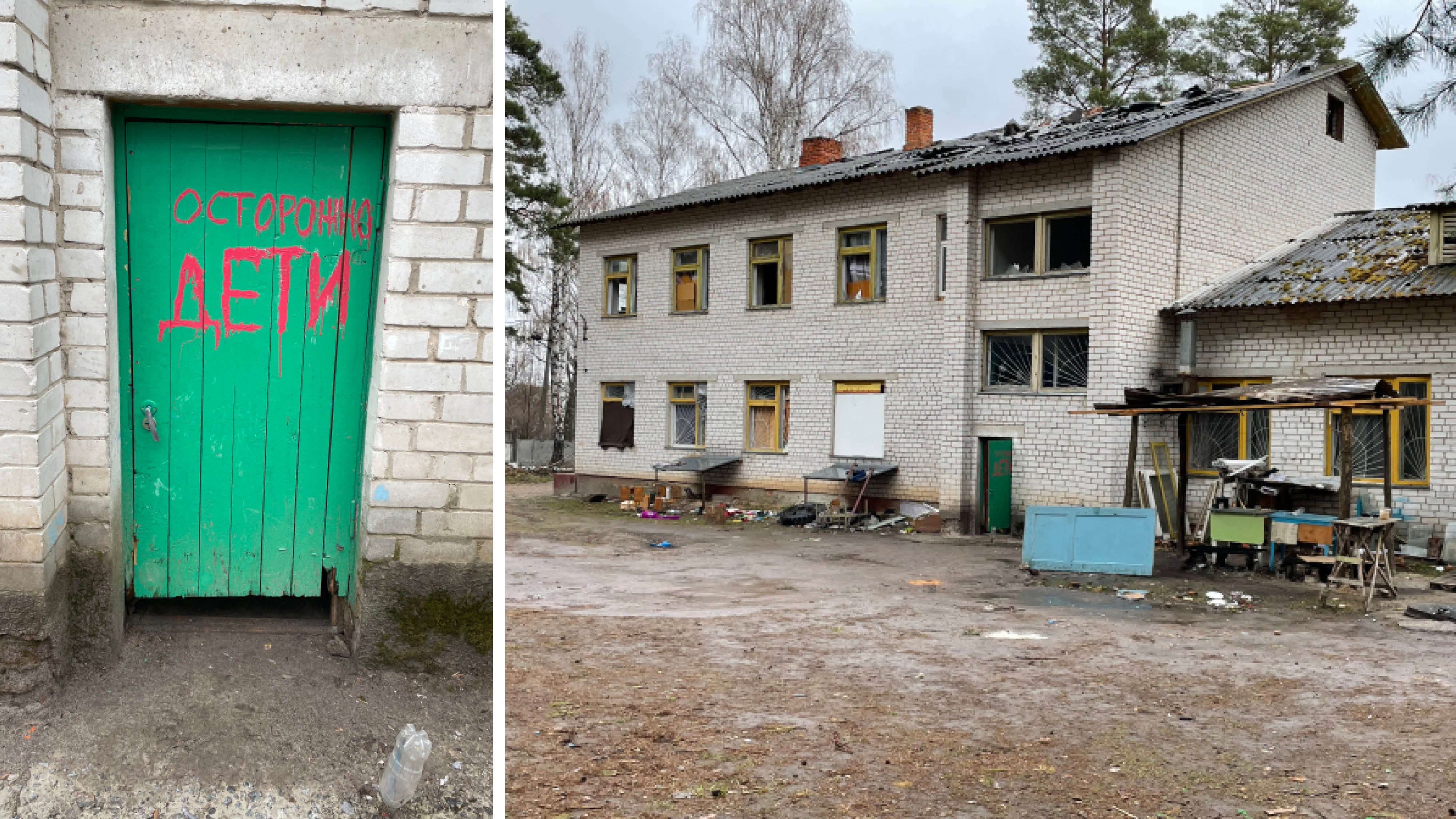 Yahidne school from behind and the green door entrance to the school basement where Russian forces held over 350 village residents for 28 days, Yahidne, April 17, 2022.