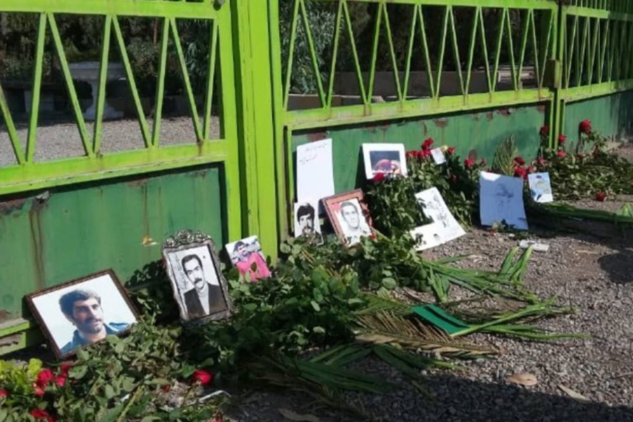 Photos of victims at a memorial commemorating those killed during the mass executions in the 1980s, Khavaran cemetery in Tehran, Iran, 2020.