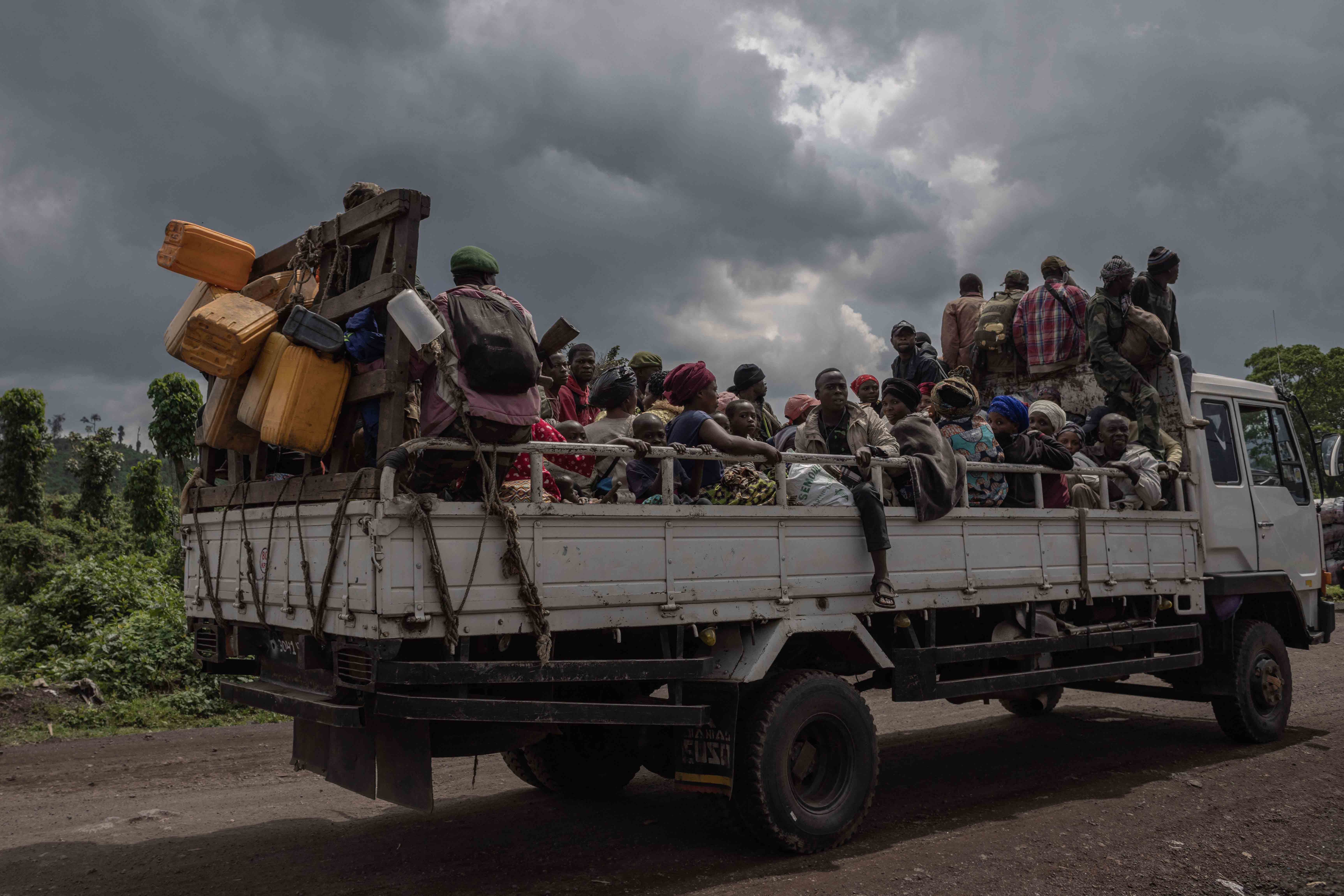 A truck full of people cut off from traffic during clashes between the Congolese army and M23 rebels in Kibumba, on the outskirts of Goma in North Kivu, Democratic Republic of Congo, June 1, 2022.