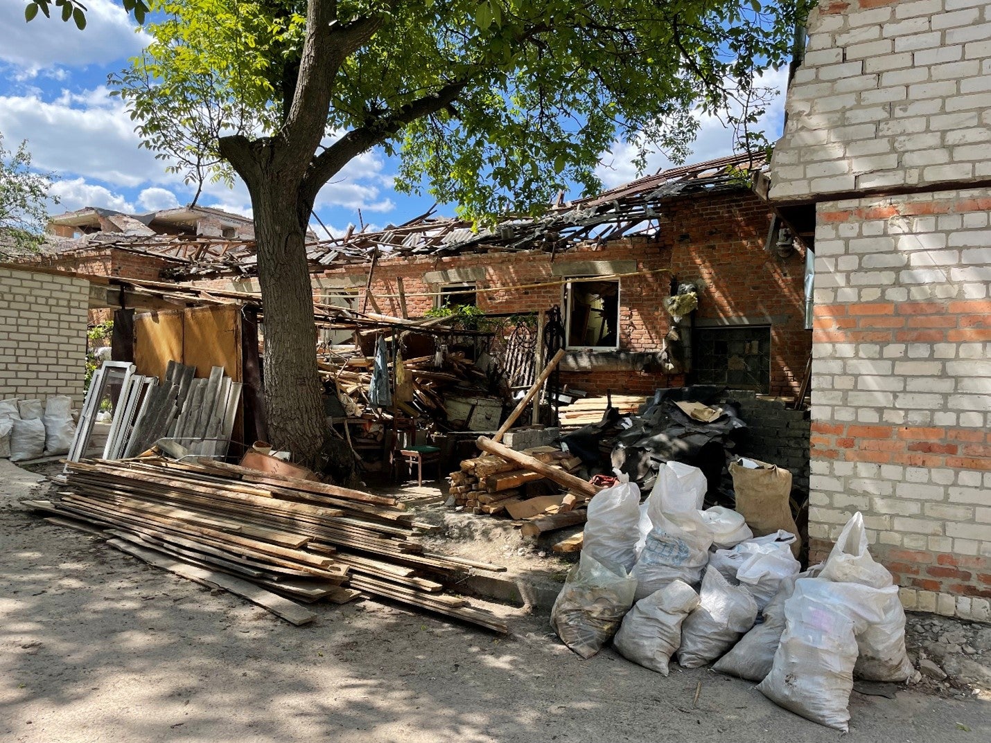 An attack on April 28 on a government health services center in the Kharkiv suburb of Pokotylivka that was being used as a Territorial Defense Forces base, which caused damage to dozens of buildings, May 24, 2022.