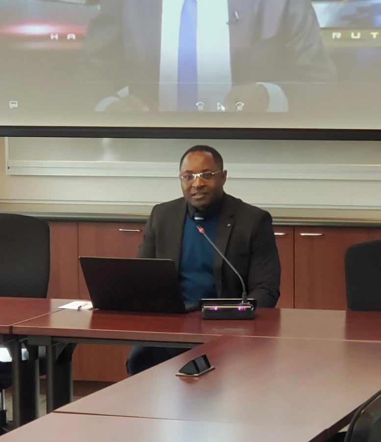 Abdul Karim Ali speaking at a conference