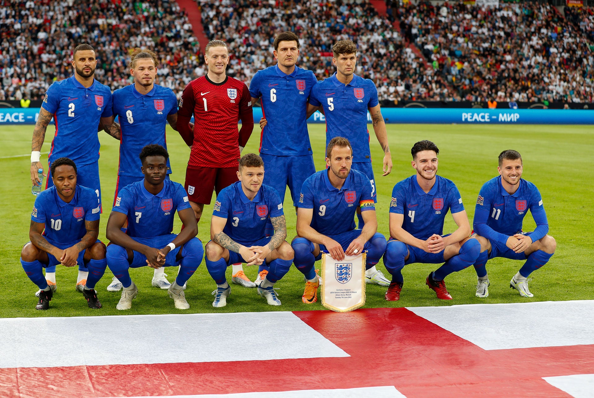 The England National Football Team line up on the pitch before a match