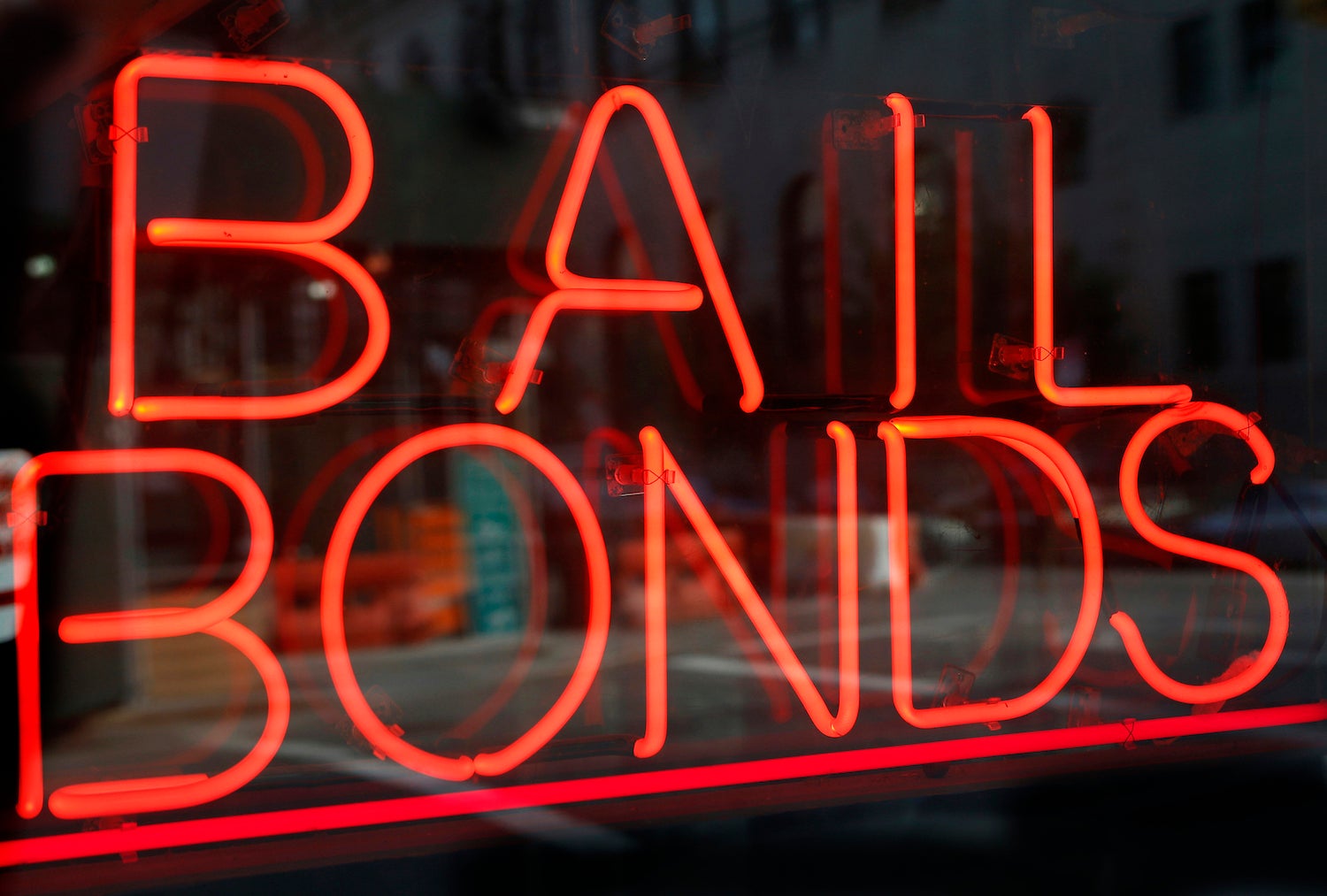 A sign advertising a bail bonds business is displayed near Brooklyn's jail and courthouse complex in New York.