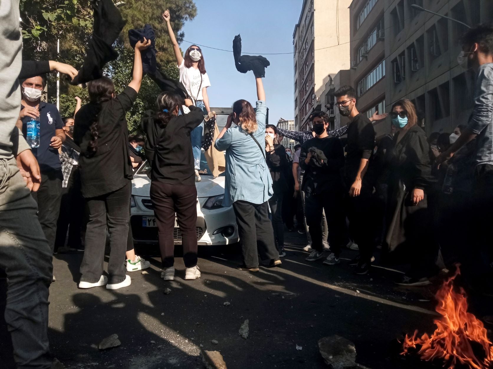 Iranian women on October 1, 2022, protest the death of Mahsa (Jina) Amini after she was detained by the morality police, in Tehran.