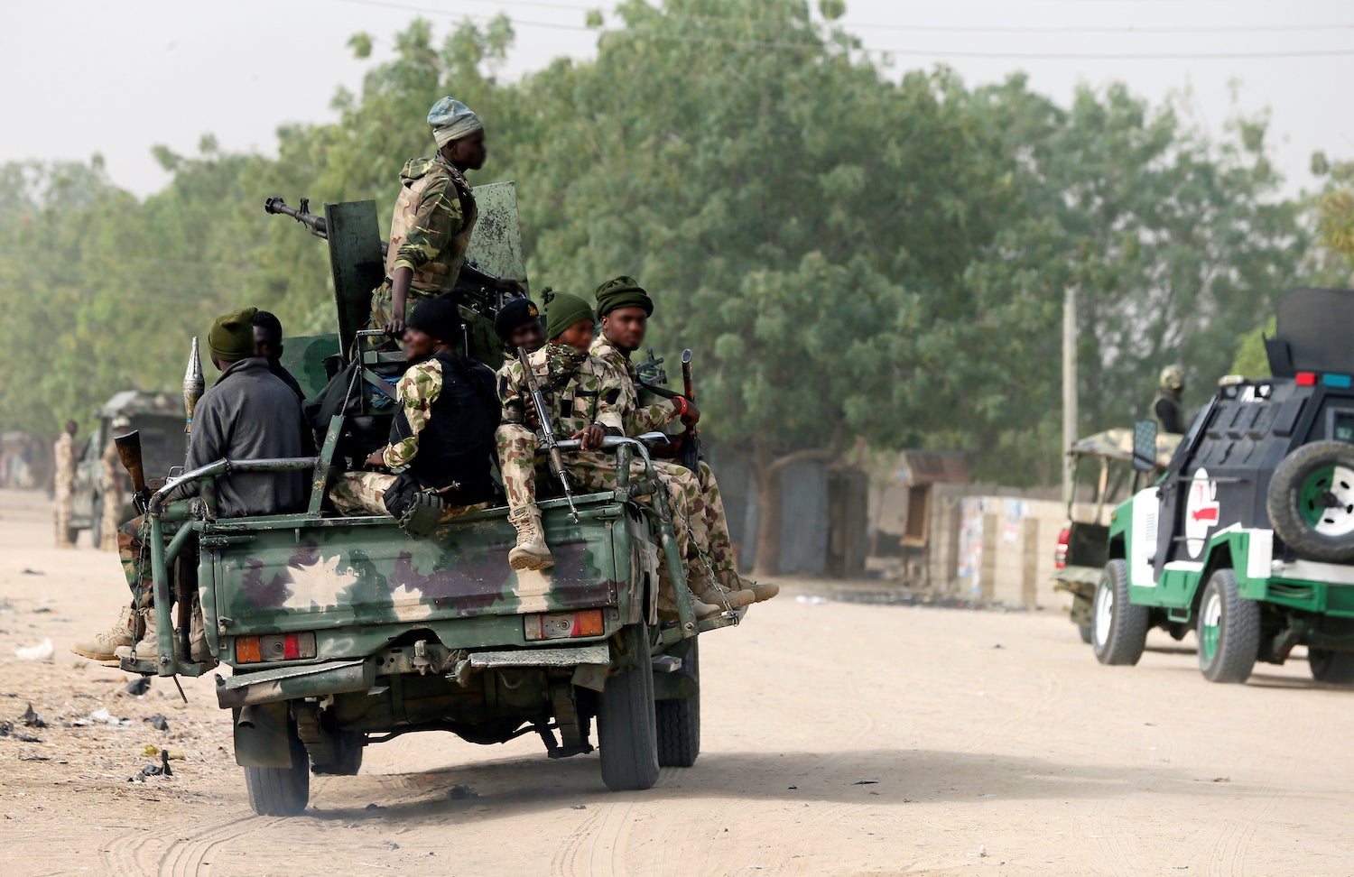 Nigerian military ride on their truck in Maiduguri. 
