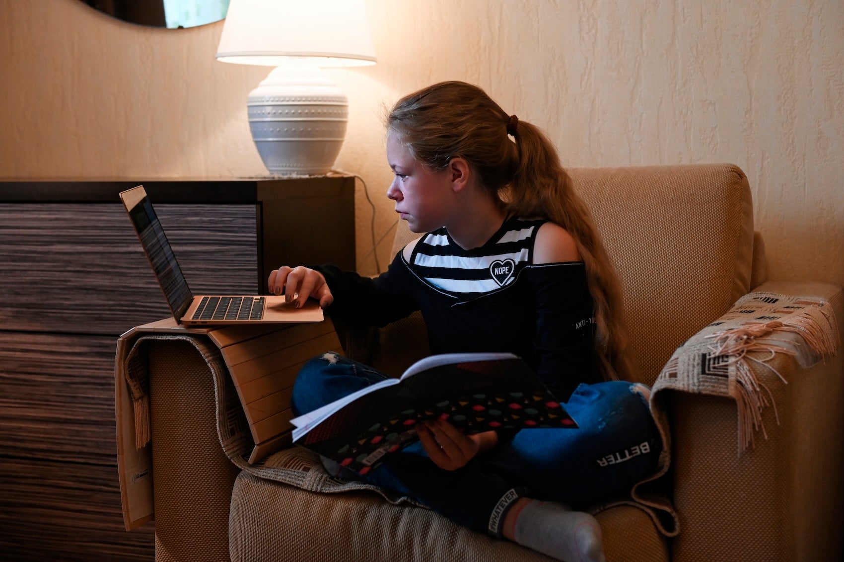 A child studies online from home in Moscow, Russia, amidst school closures during the Covid-19 pandemic.