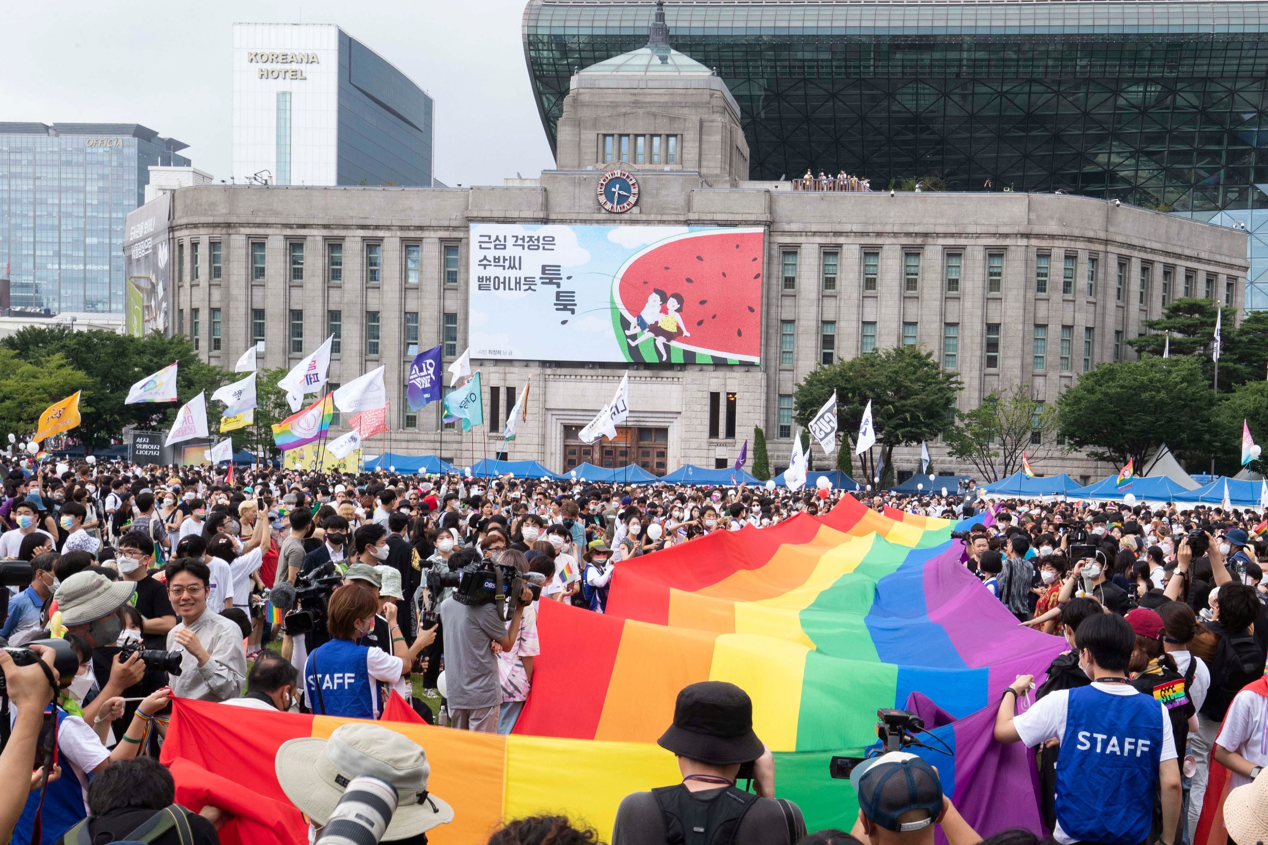 People rally at the Seoul Queer Culture Festival in front of city hall in Seoul, South Korea.
